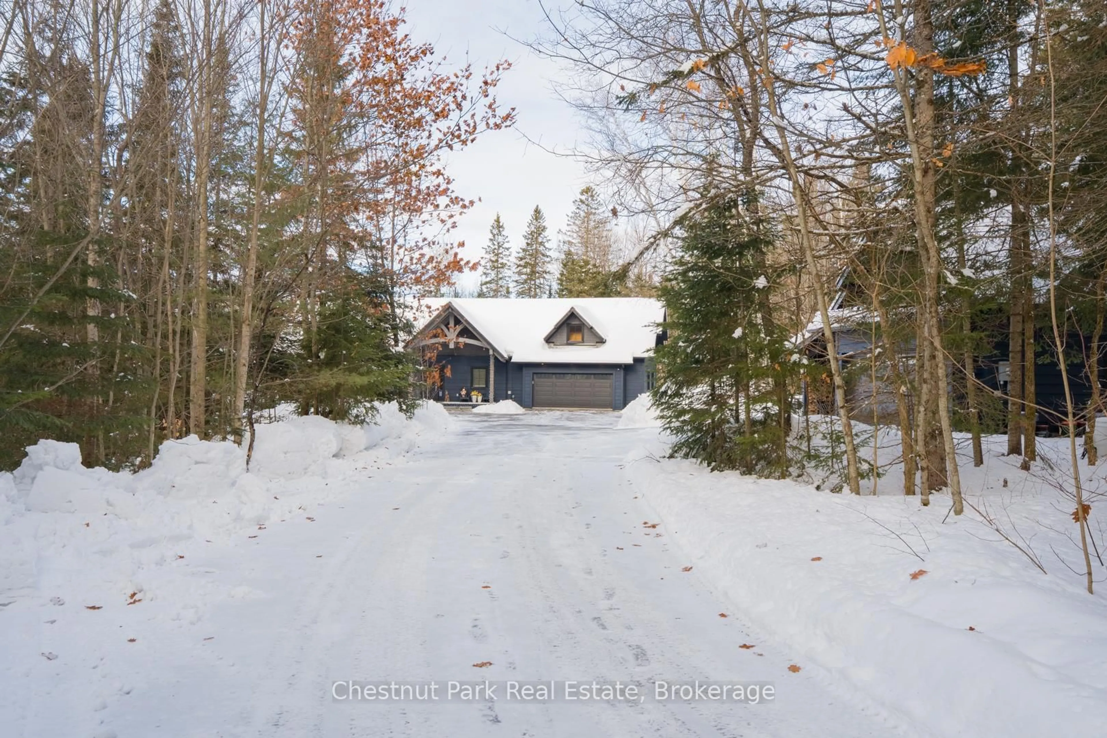 A pic from outside/outdoor area/front of a property/back of a property/a pic from drone, forest/trees view for 86 BOWYER Rd, Huntsville Ontario P1H 2J4