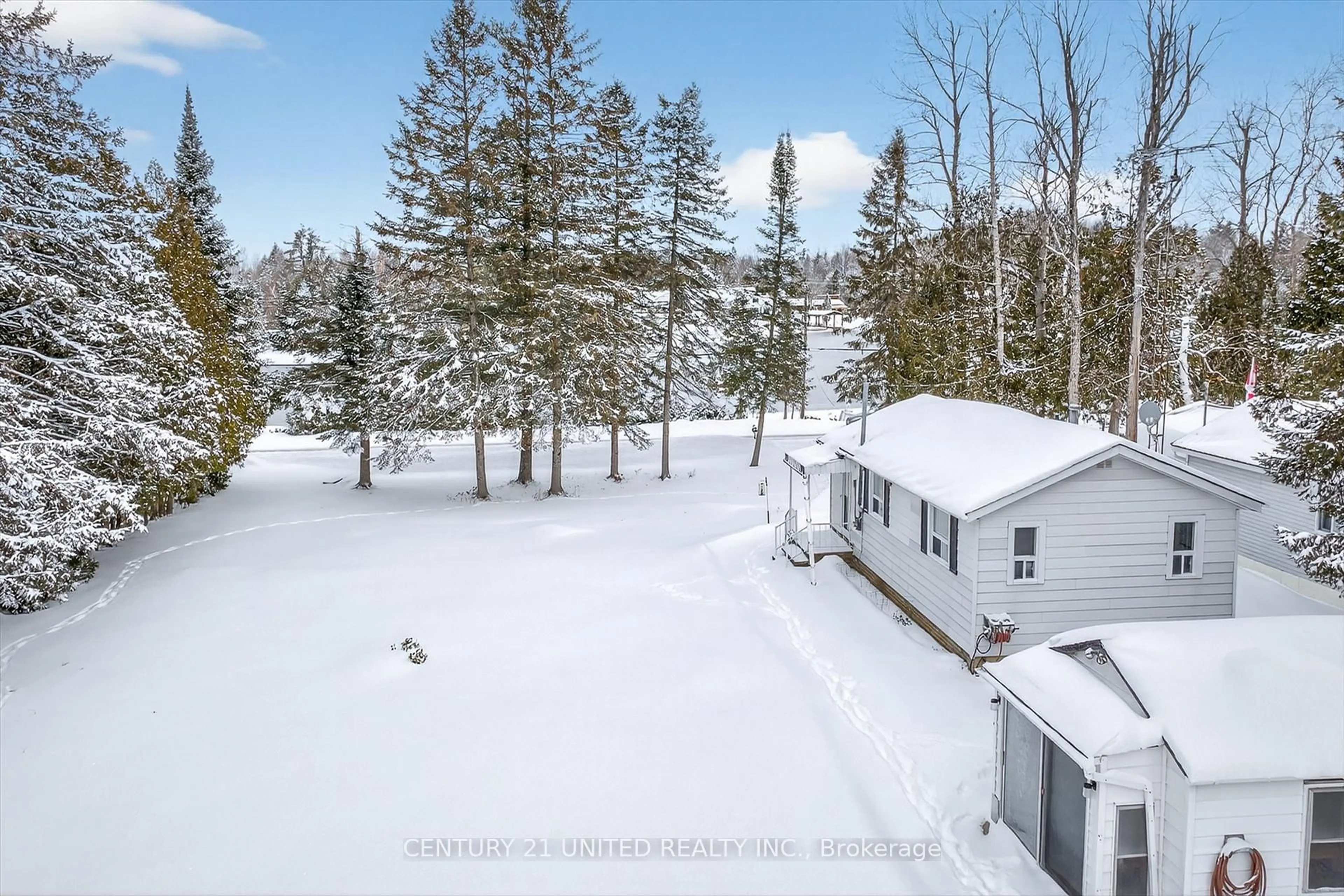 A pic from outside/outdoor area/front of a property/back of a property/a pic from drone, forest/trees view for 90 Trent Canal Rd, Kawartha Lakes Ontario K0M 1N0