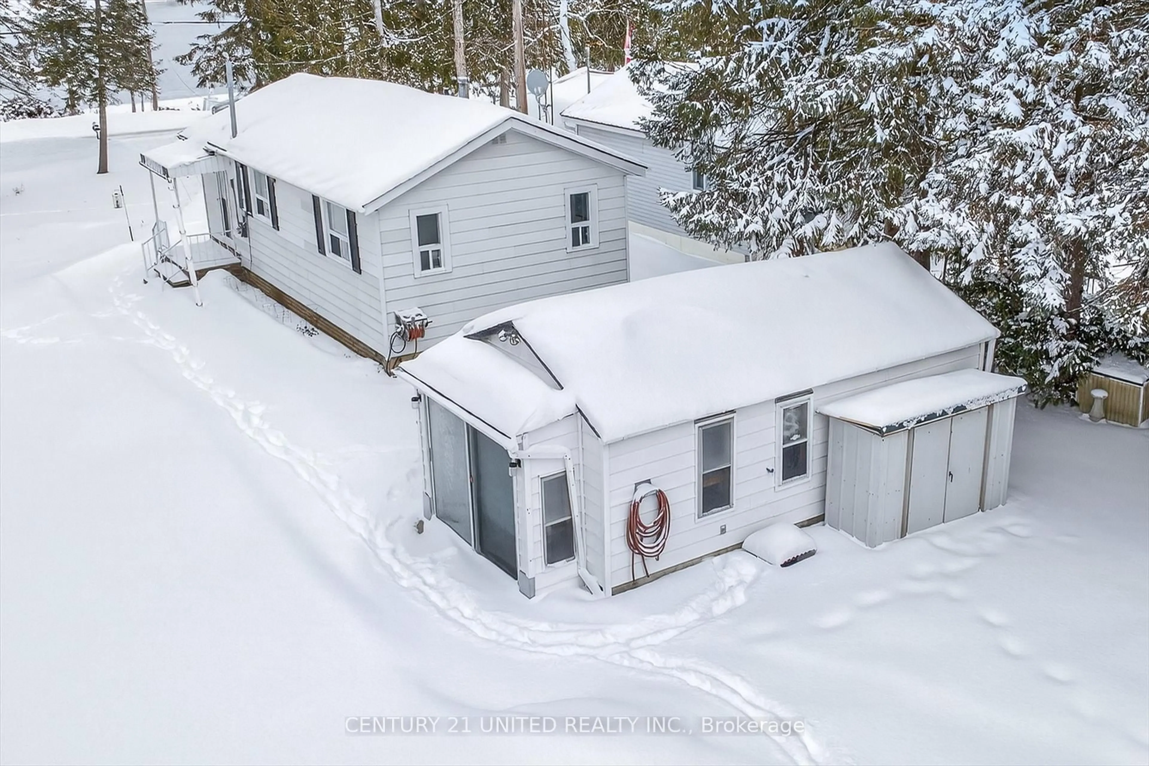 A pic from outside/outdoor area/front of a property/back of a property/a pic from drone, street for 90 Trent Canal Rd, Kawartha Lakes Ontario K0M 1N0