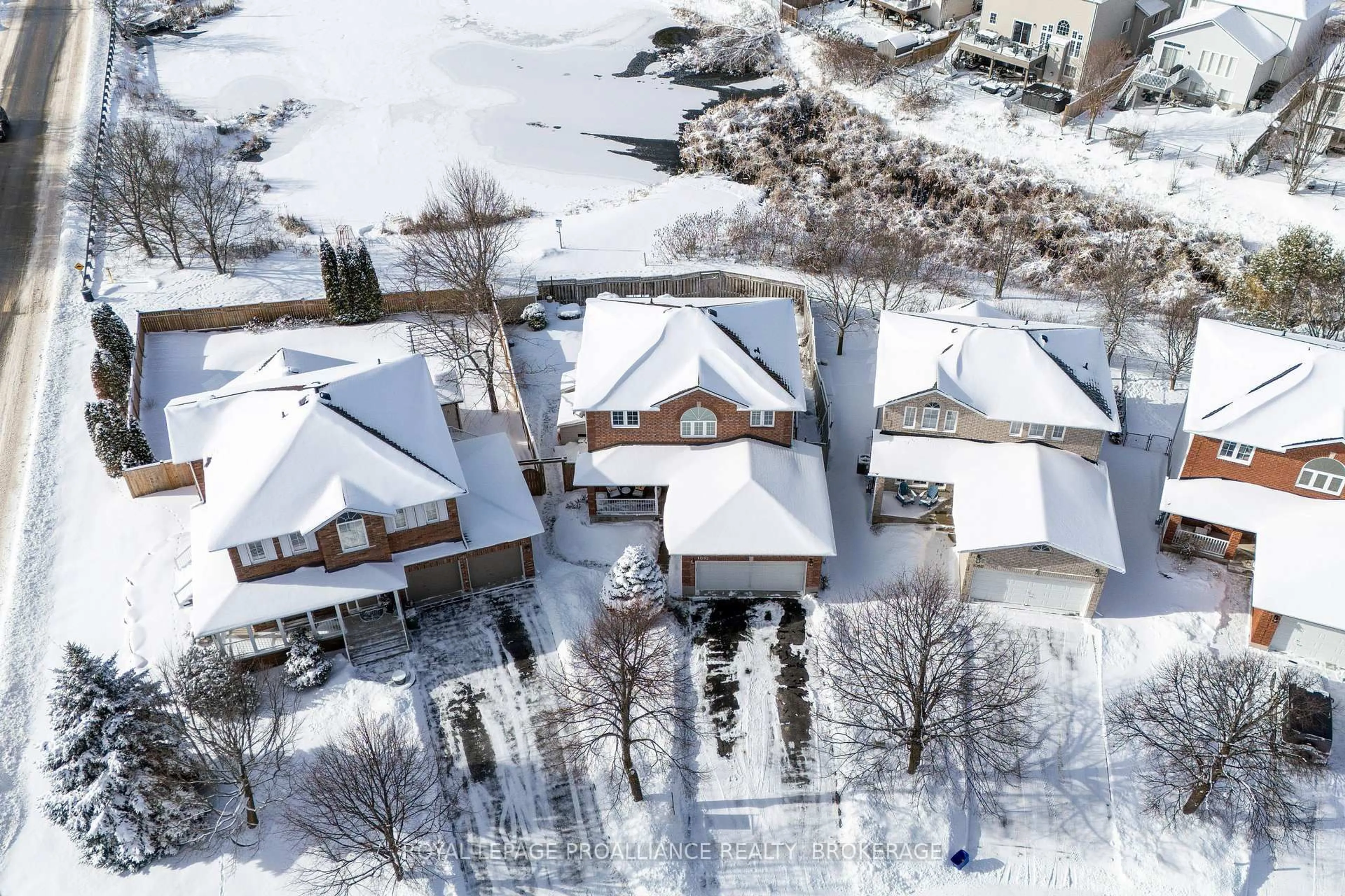 A pic from outside/outdoor area/front of a property/back of a property/a pic from drone, street for 1092 Wise St, Kingston Ontario K7P 3E5