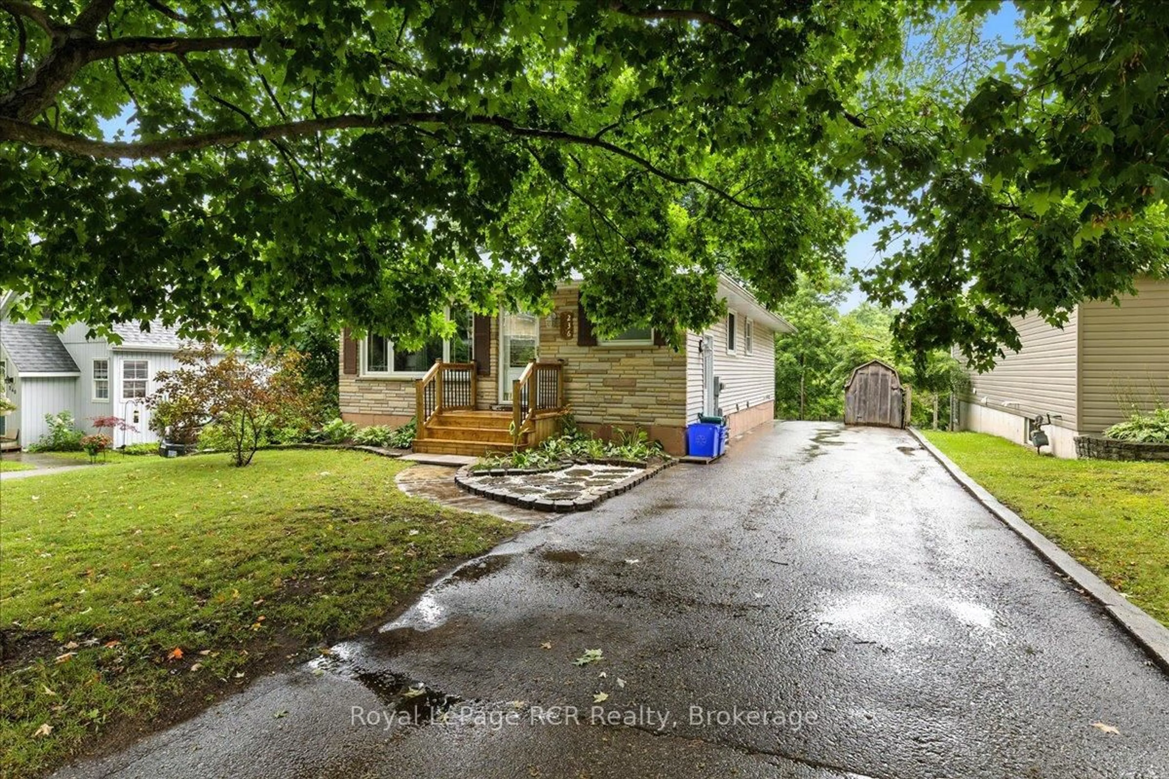 A pic from outside/outdoor area/front of a property/back of a property/a pic from drone, street for 236 Normanby St, Wellington North Ontario N0G 2L1