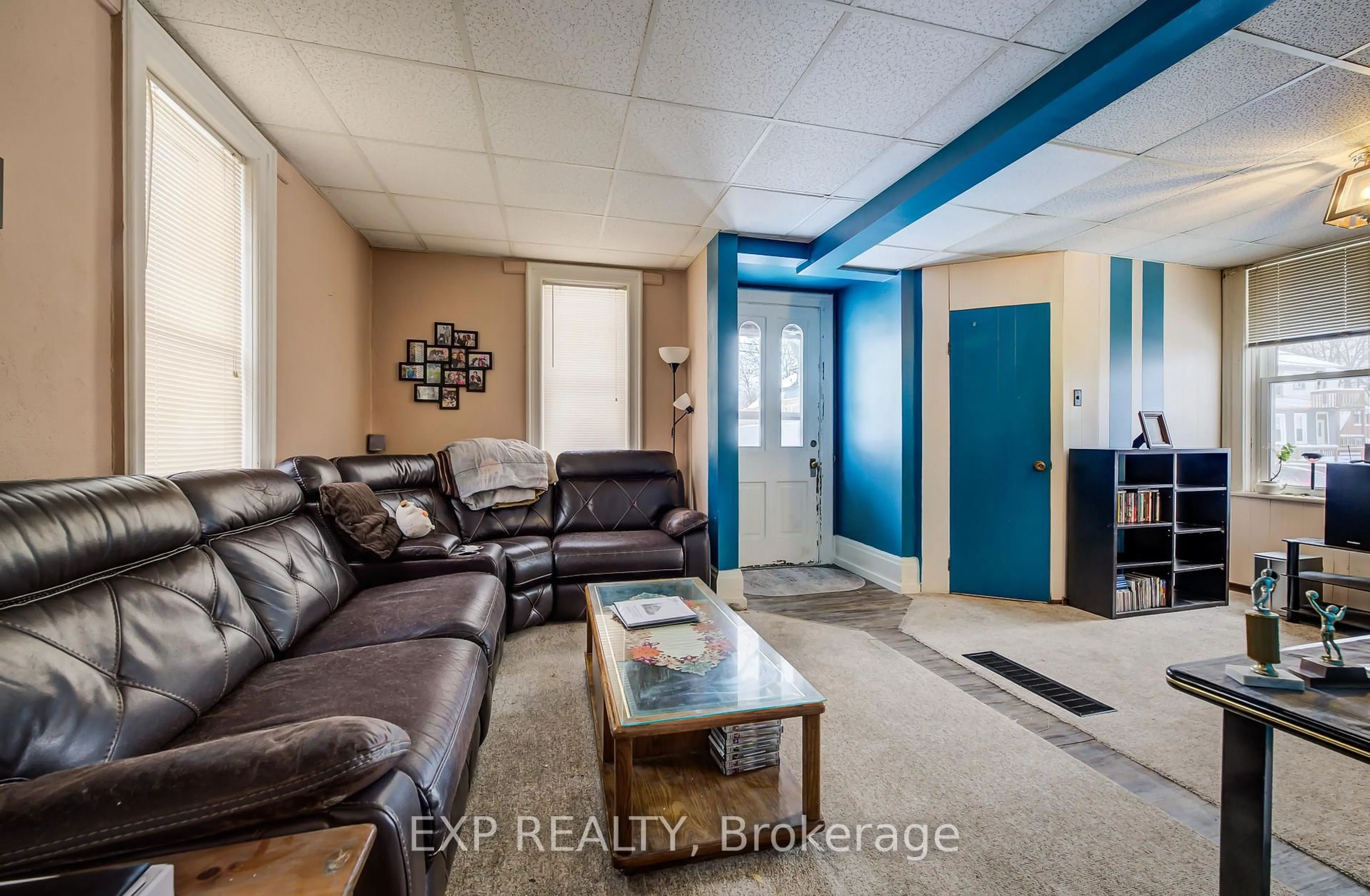 Living room with furniture, ceramic/tile floor for 105 St George St, Kitchener Ontario N2G 2T2