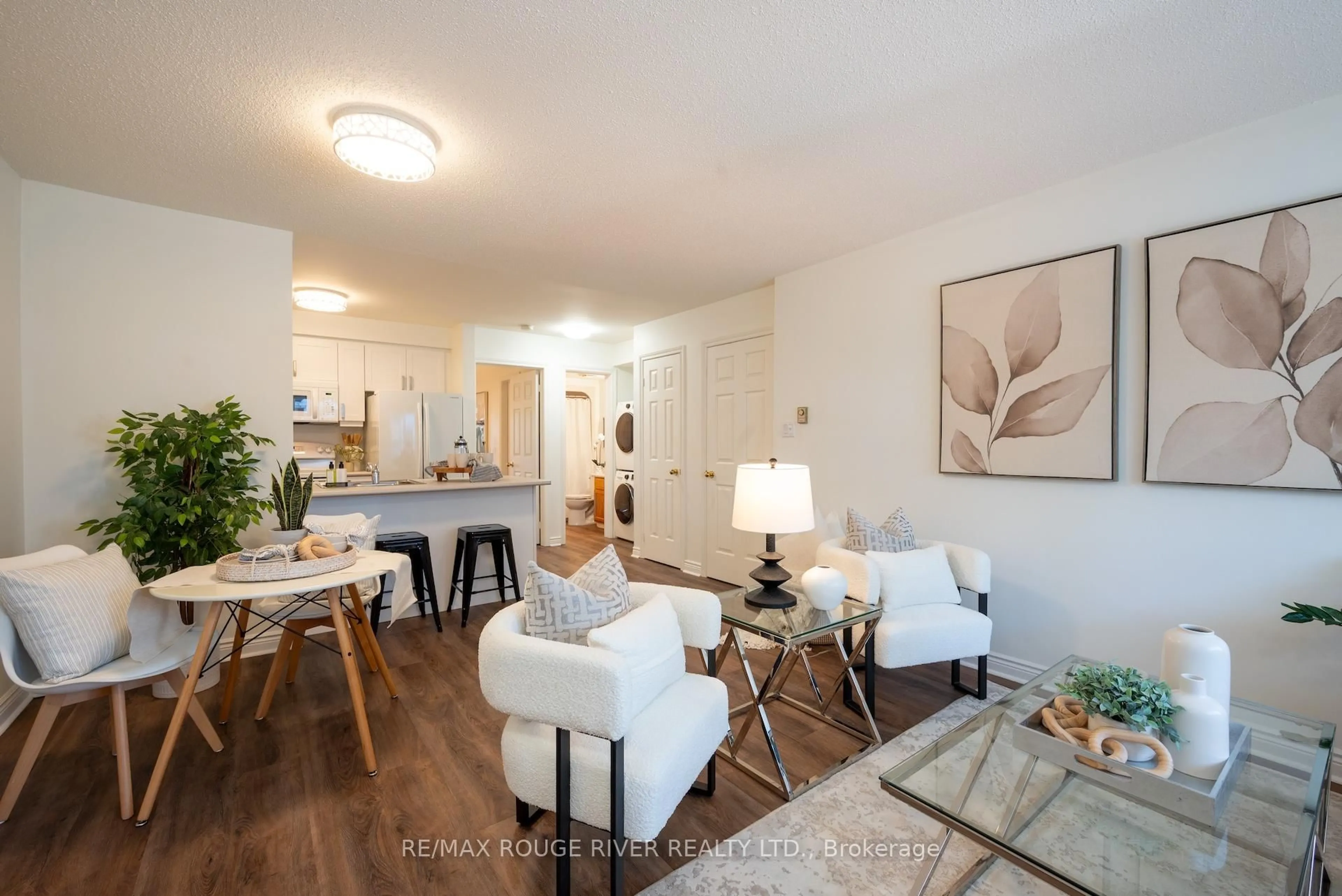 Living room with furniture, wood/laminate floor for 182 D'arcy St #C-103, Cobourg Ontario K9A 5H9