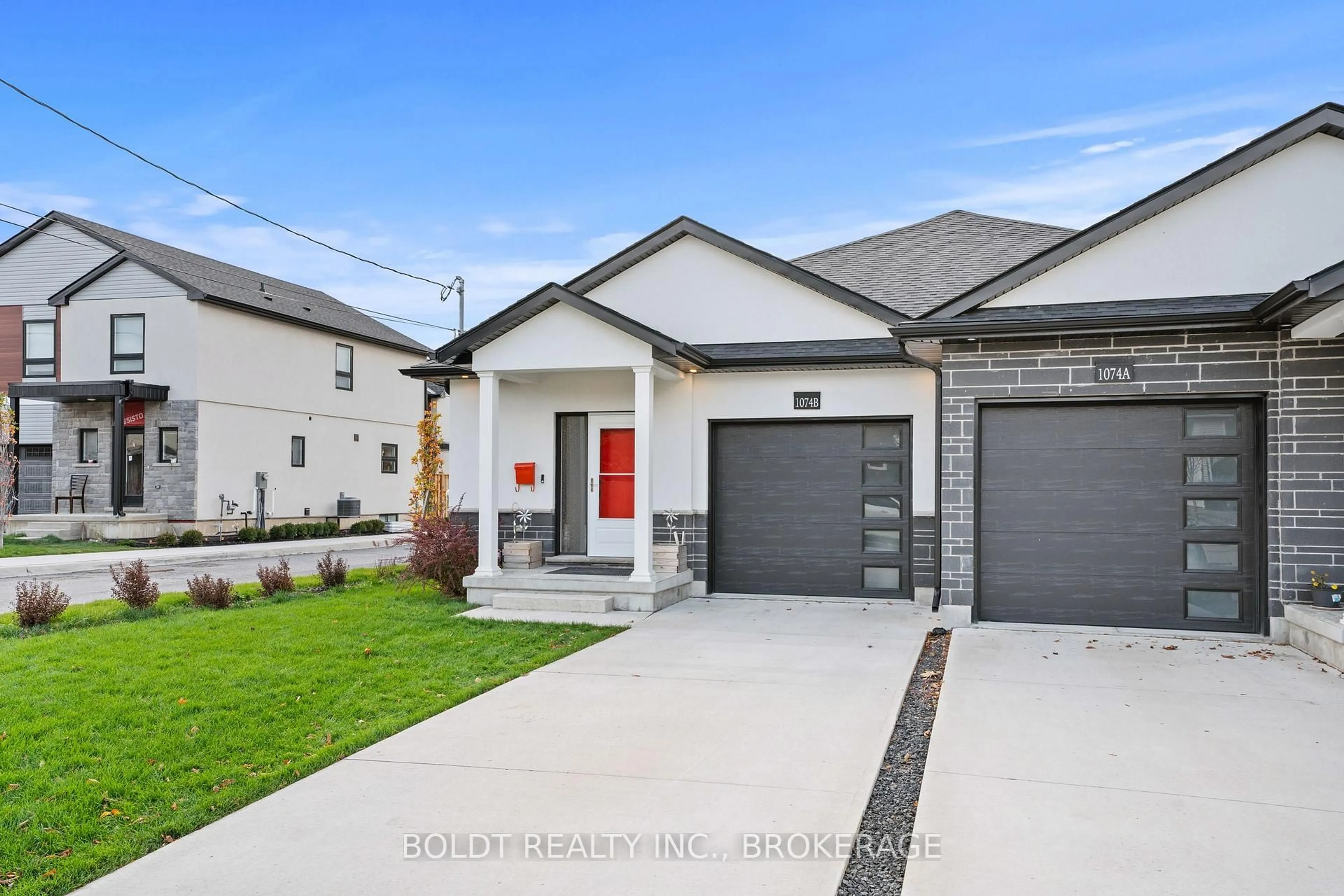 Home with brick exterior material, street for 1074B Vansickle Rd, St. Catharines Ontario L2S 2X3