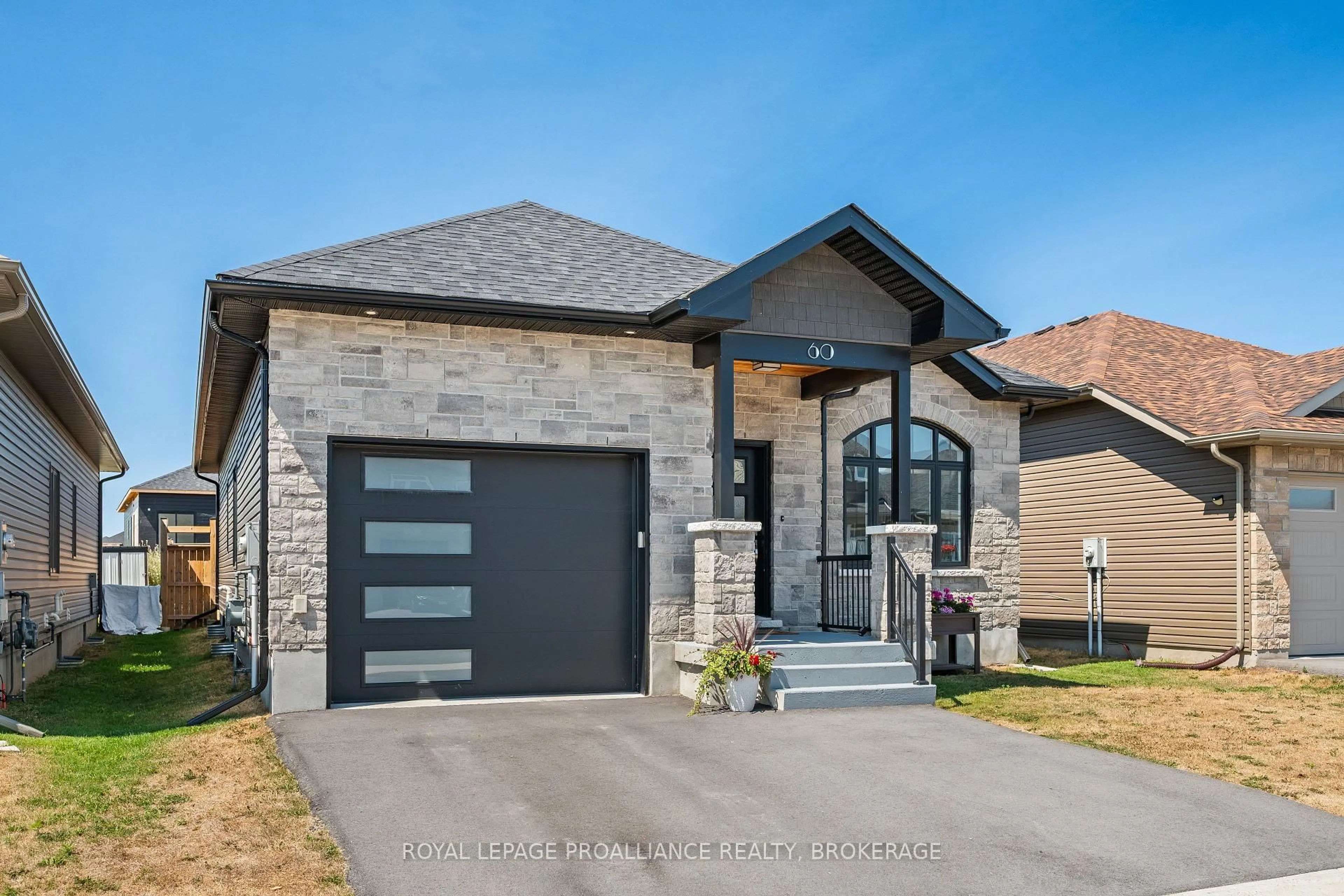 Home with brick exterior material, street for 60 Potter Dr, Bissett Creek Ontario K0H 2H0