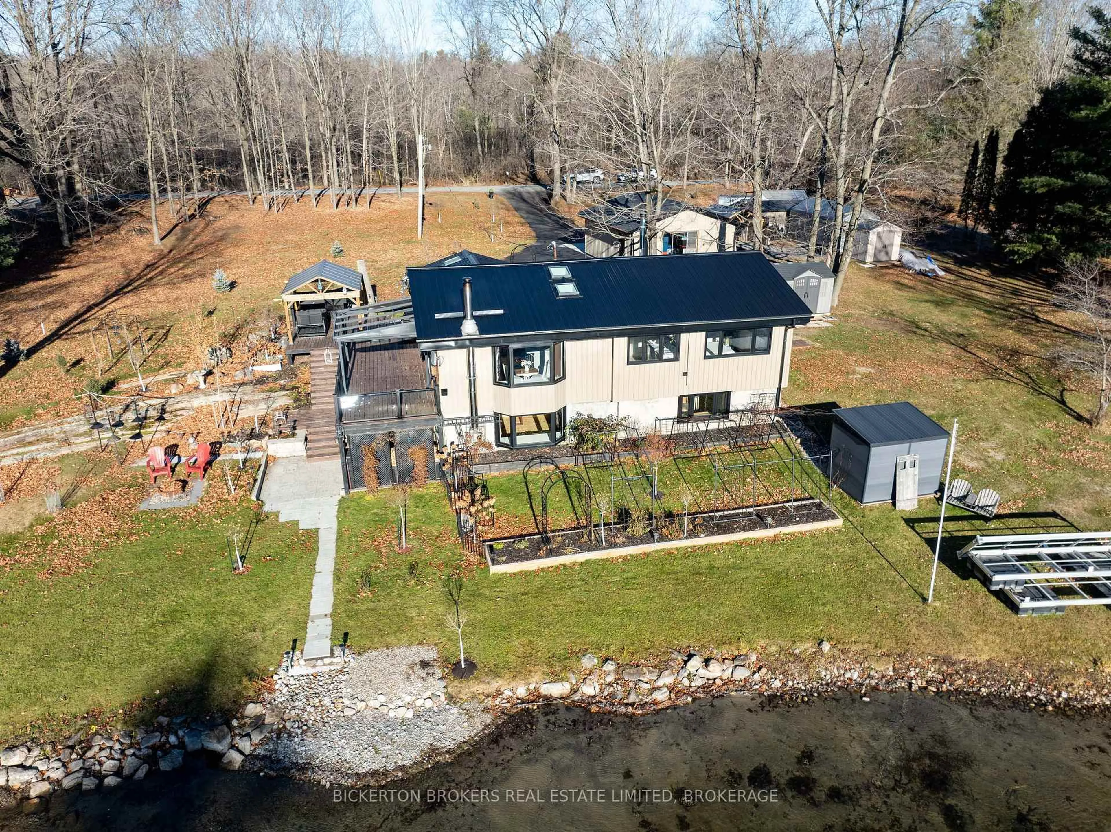 A pic from outside/outdoor area/front of a property/back of a property/a pic from drone, water/lake/river/ocean view for 1927 Hogan Rd, Perth Road Ontario K0H 2L0