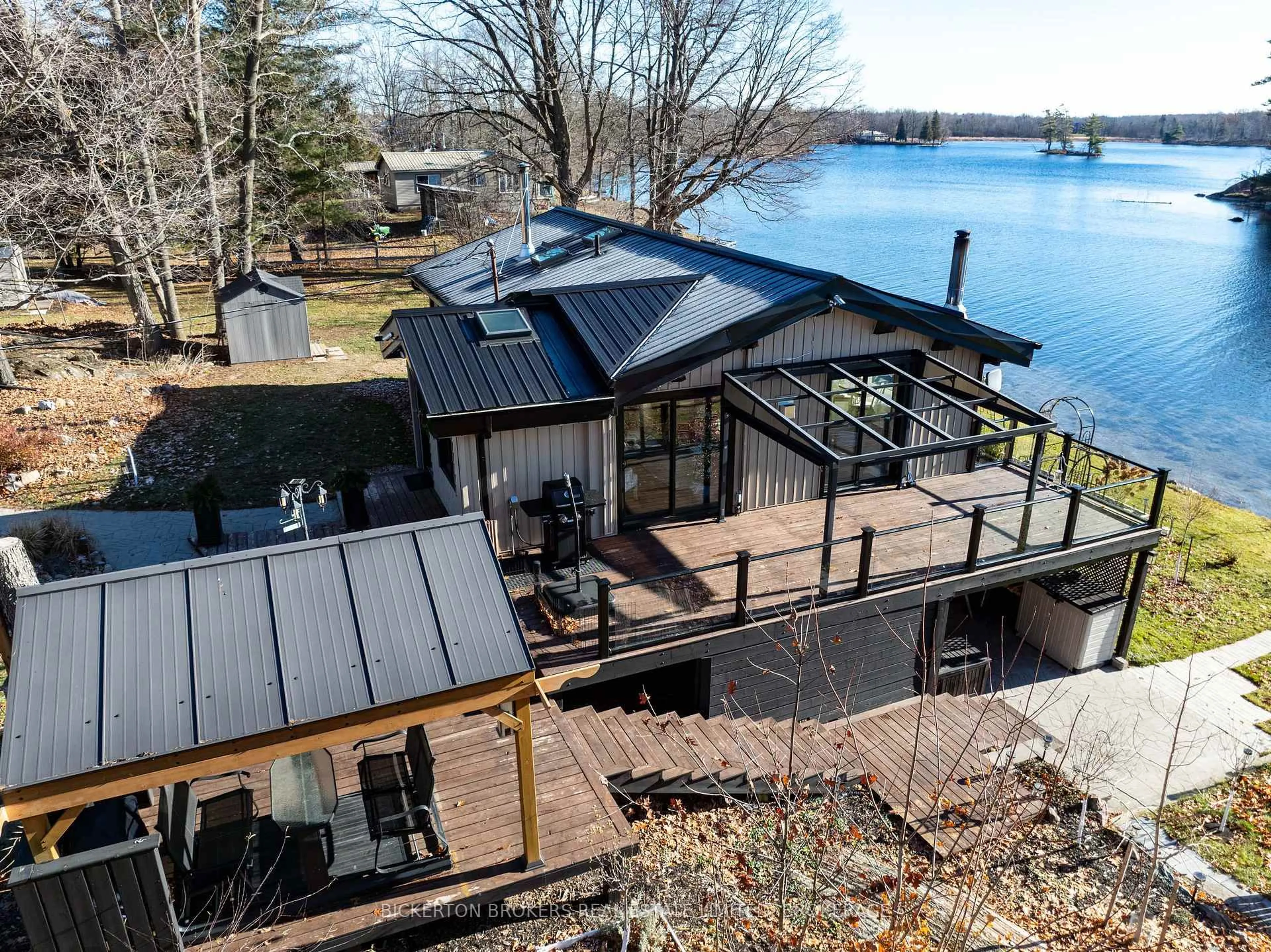 A pic from outside/outdoor area/front of a property/back of a property/a pic from drone, water/lake/river/ocean view for 1927 Hogan Rd, Perth Road Ontario K0H 2L0