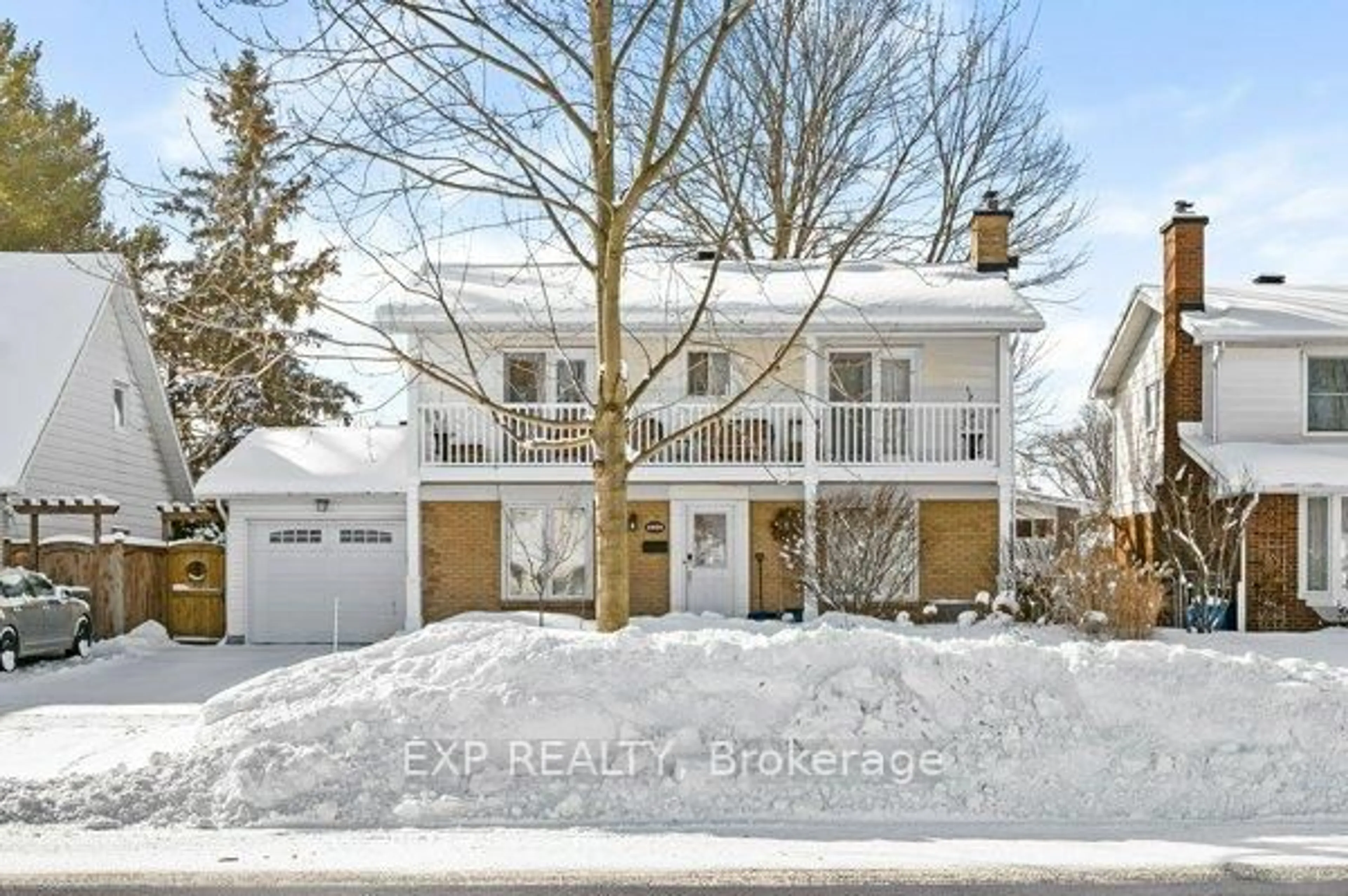 Home with brick exterior material, street for 2389 Ogilvie Rd, Ottawa Ontario K1J 7N4