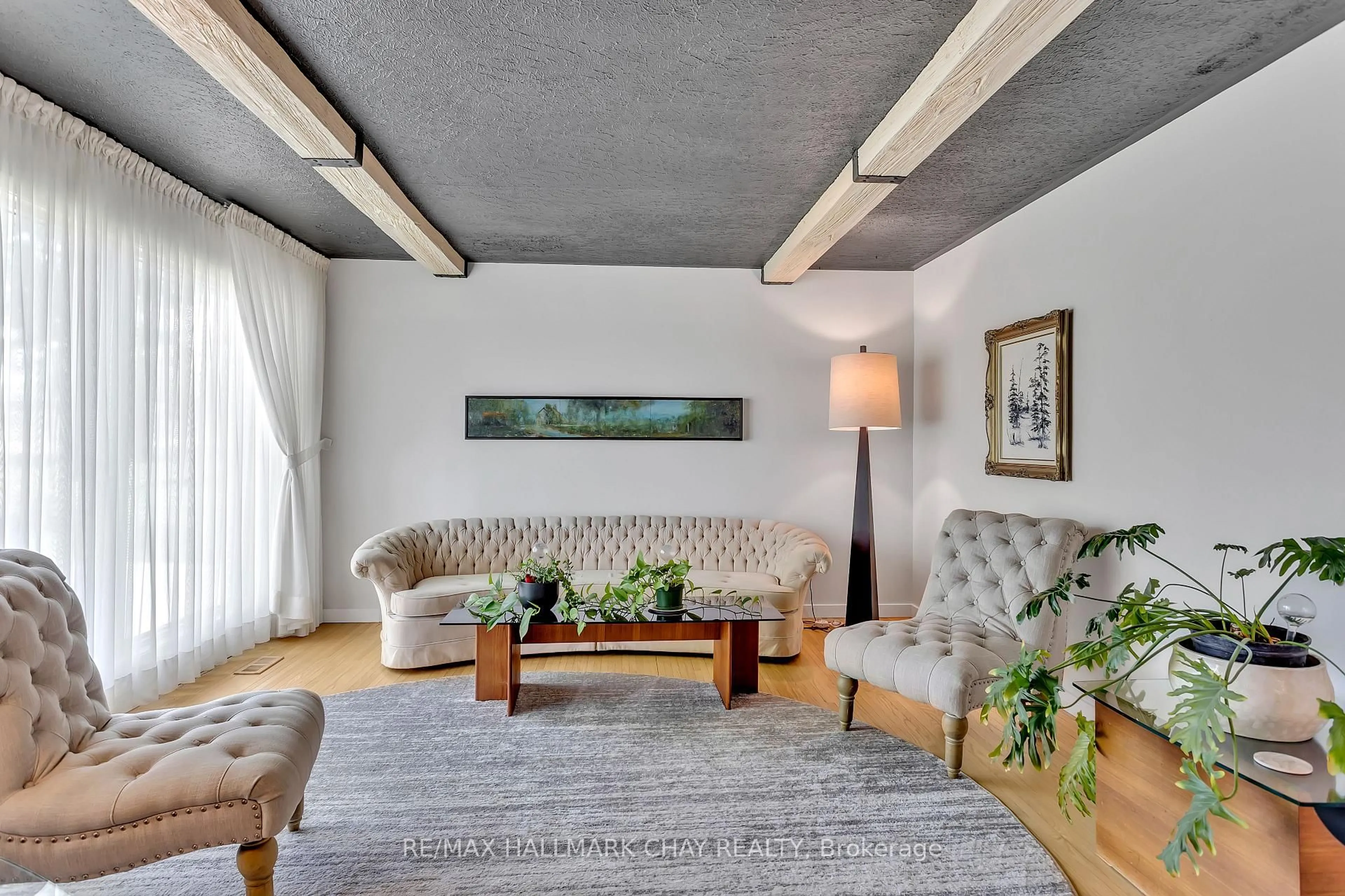 Living room with furniture, cement floor for 1009 FAIRBAIRN St, Peterborough Ontario K9K 1C1