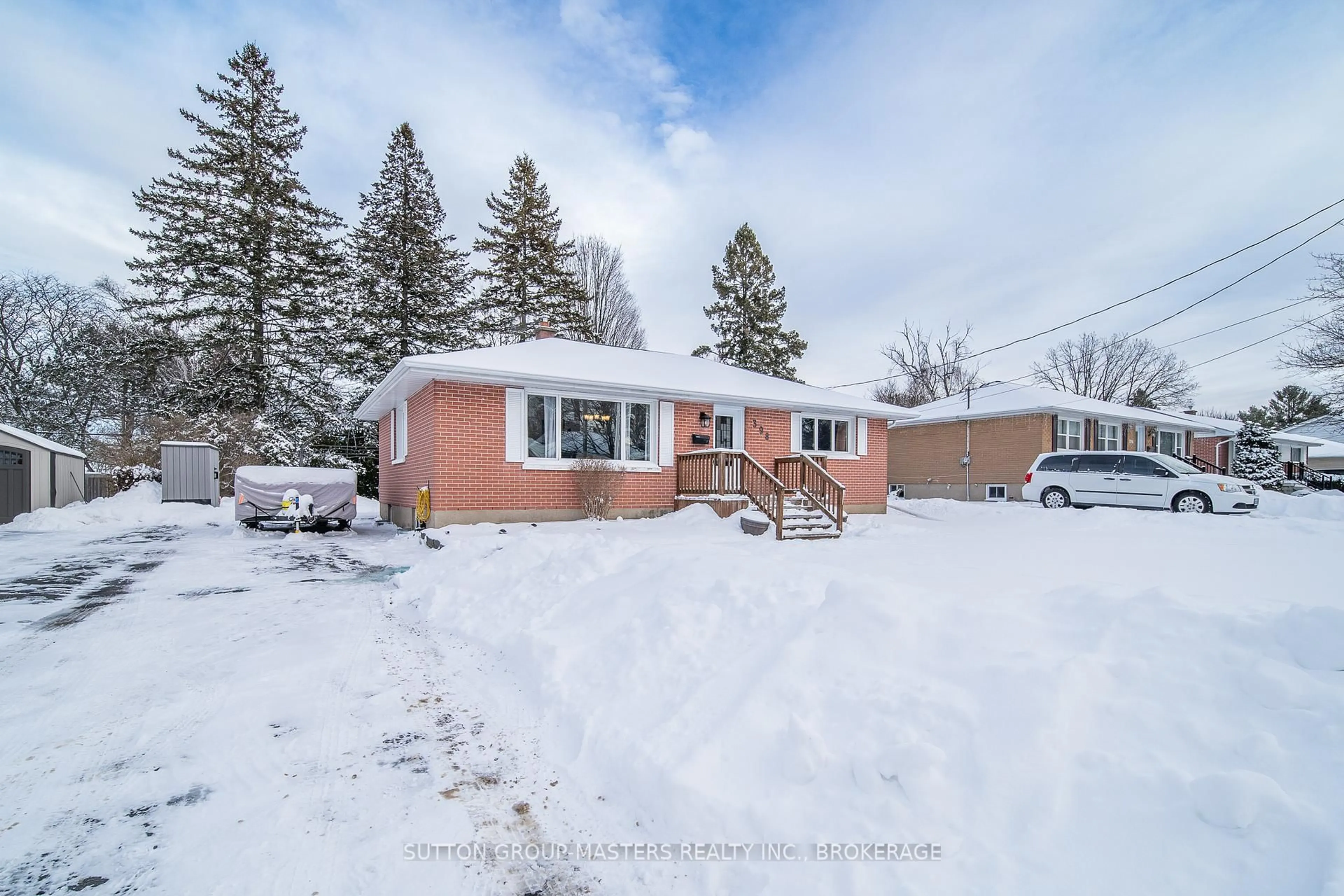 A pic from outside/outdoor area/front of a property/back of a property/a pic from drone, street for 398 Mcewen Dr, Kingston Ontario K7M 3W3