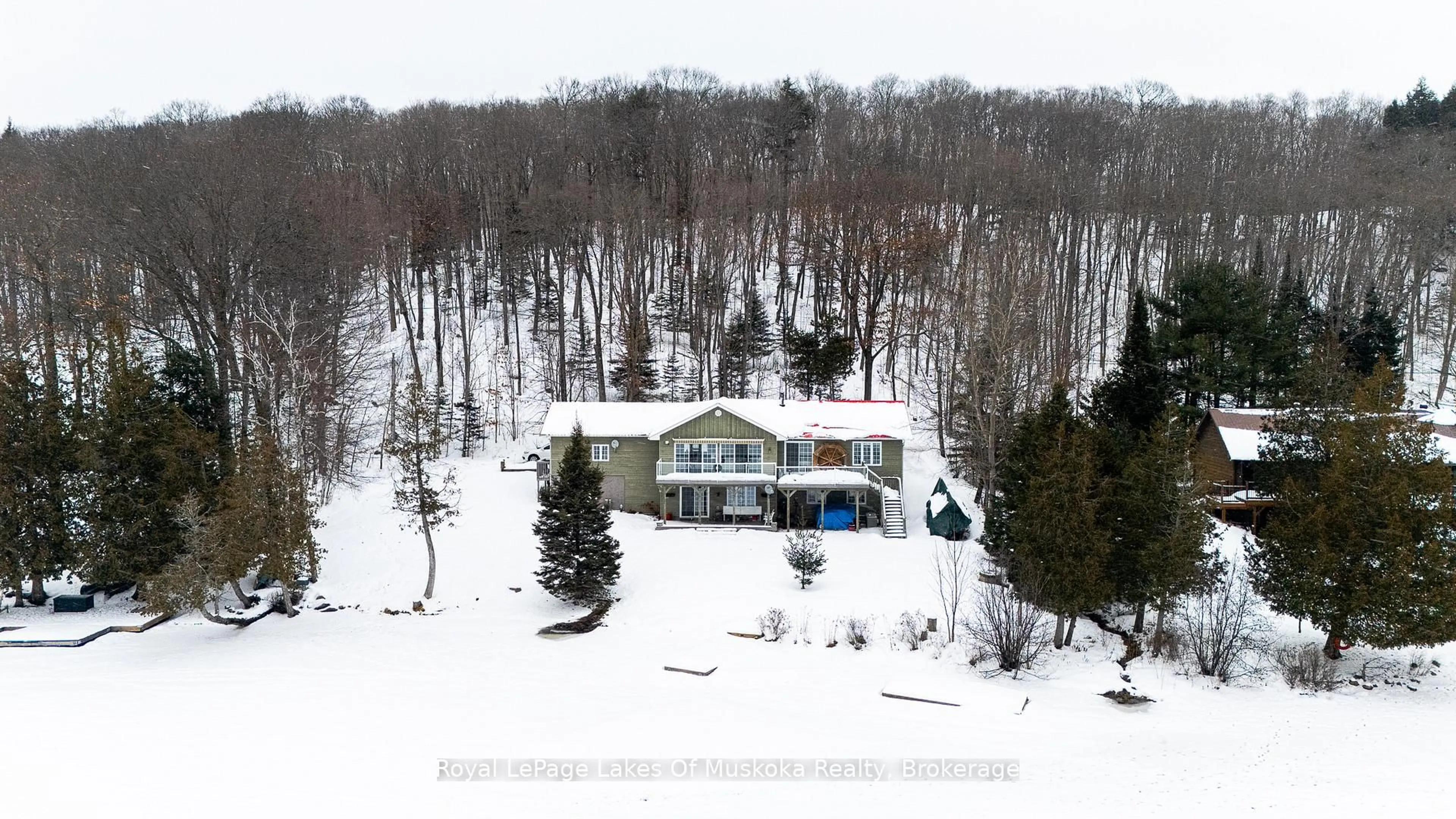 A pic from outside/outdoor area/front of a property/back of a property/a pic from drone, unknown for 300 Wurm Rd, Magnetawan Ontario P0A 1P0