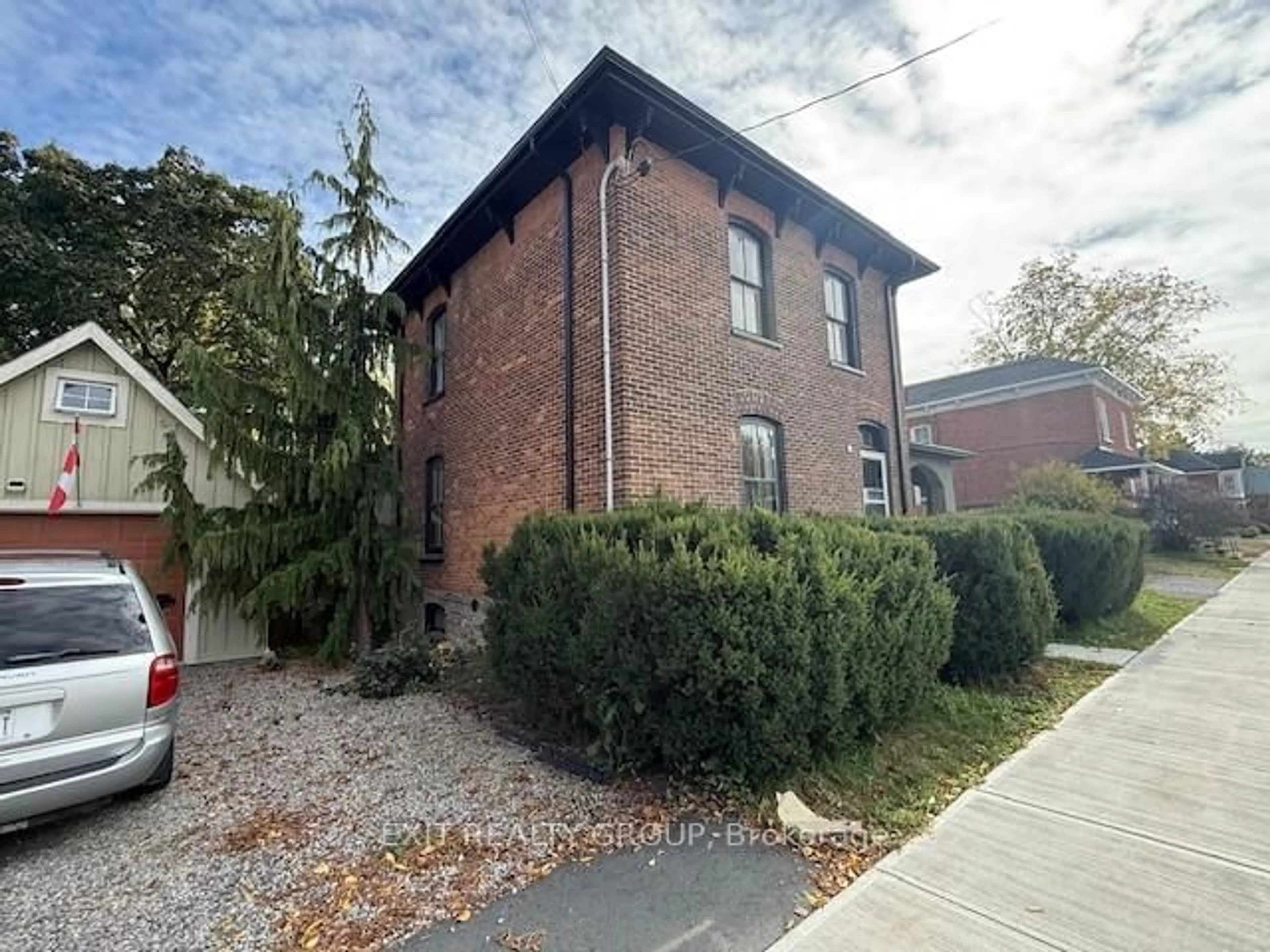 Home with brick exterior material, street for 368 Picton Main St, Prince Edward County Ontario K0K 2T0