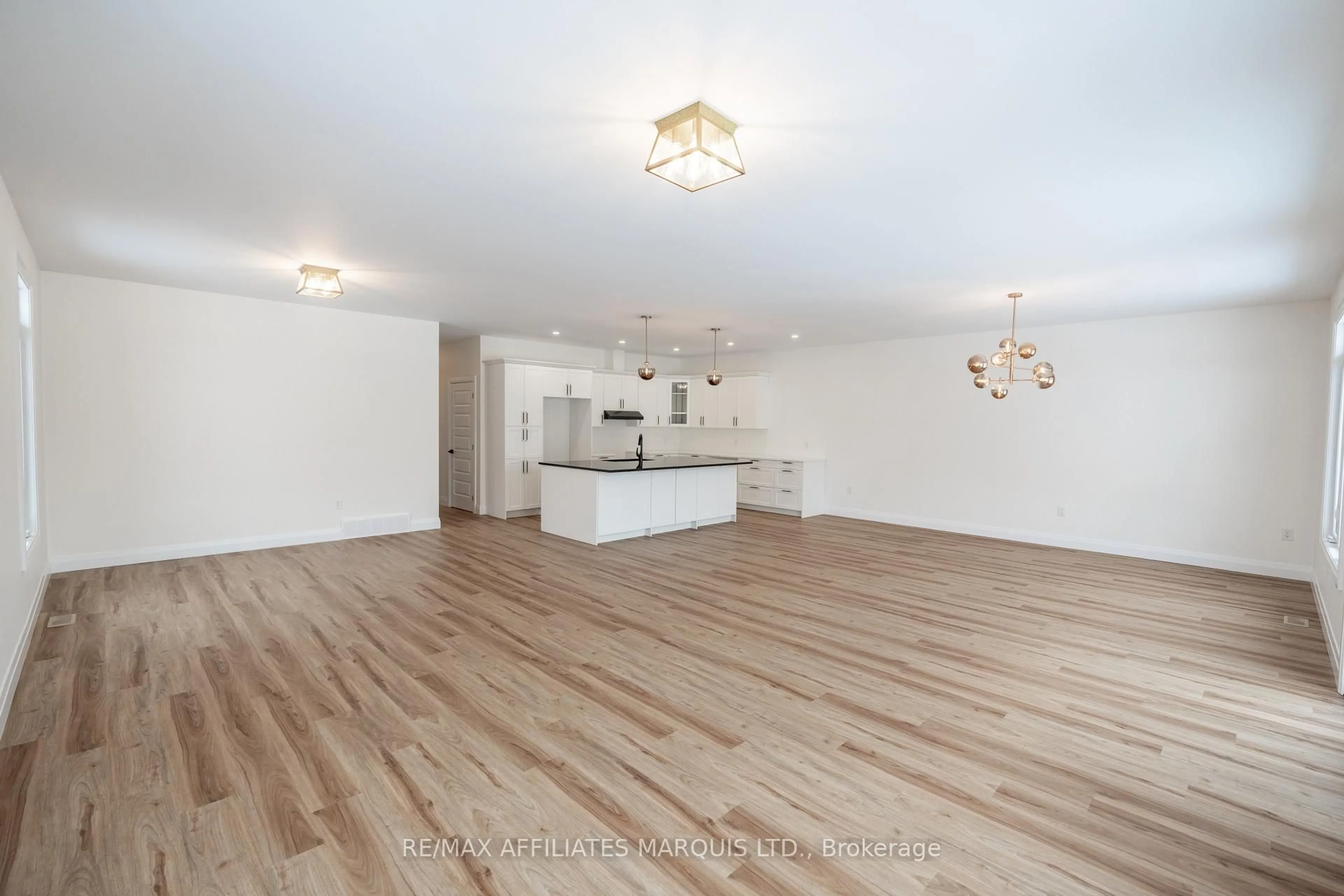 Open concept kitchen, wood/laminate floor for 2286 Crewson Cres, Cornwall Ontario K6H 0H5