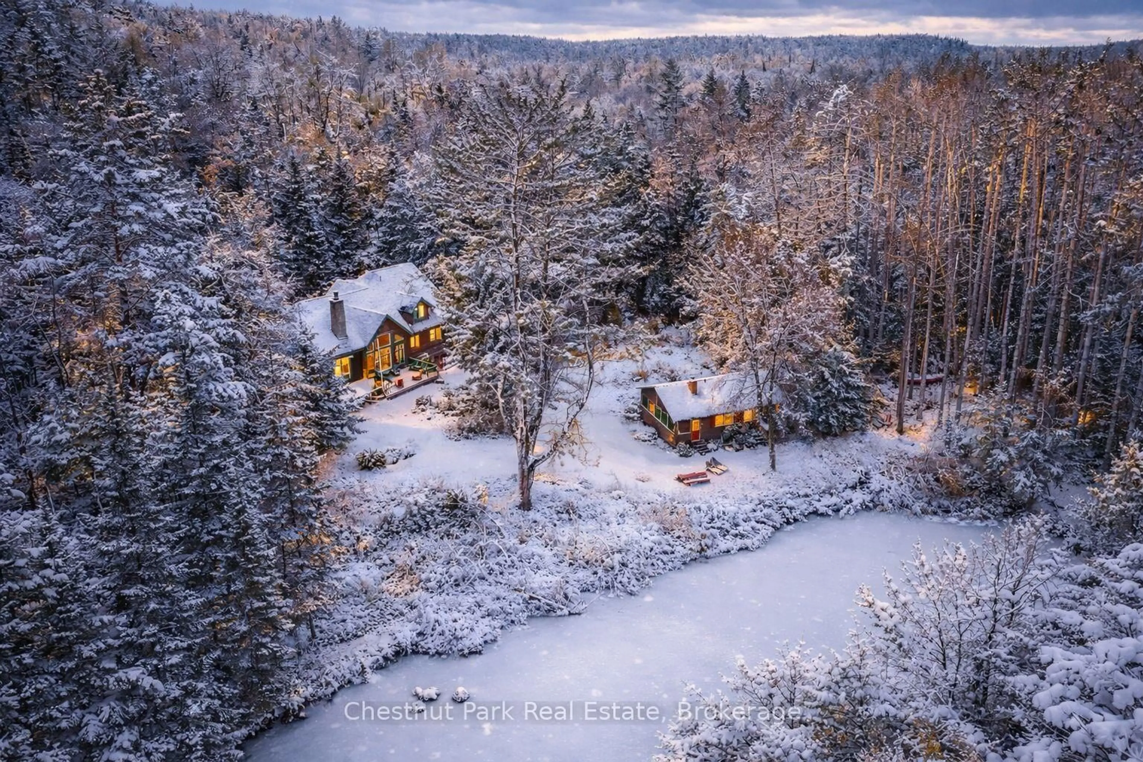 A pic from outside/outdoor area/front of a property/back of a property/a pic from drone, forest/trees view for 1230 MIRIAM Dr #1 & 2, Bracebridge Ontario P1L 1X1