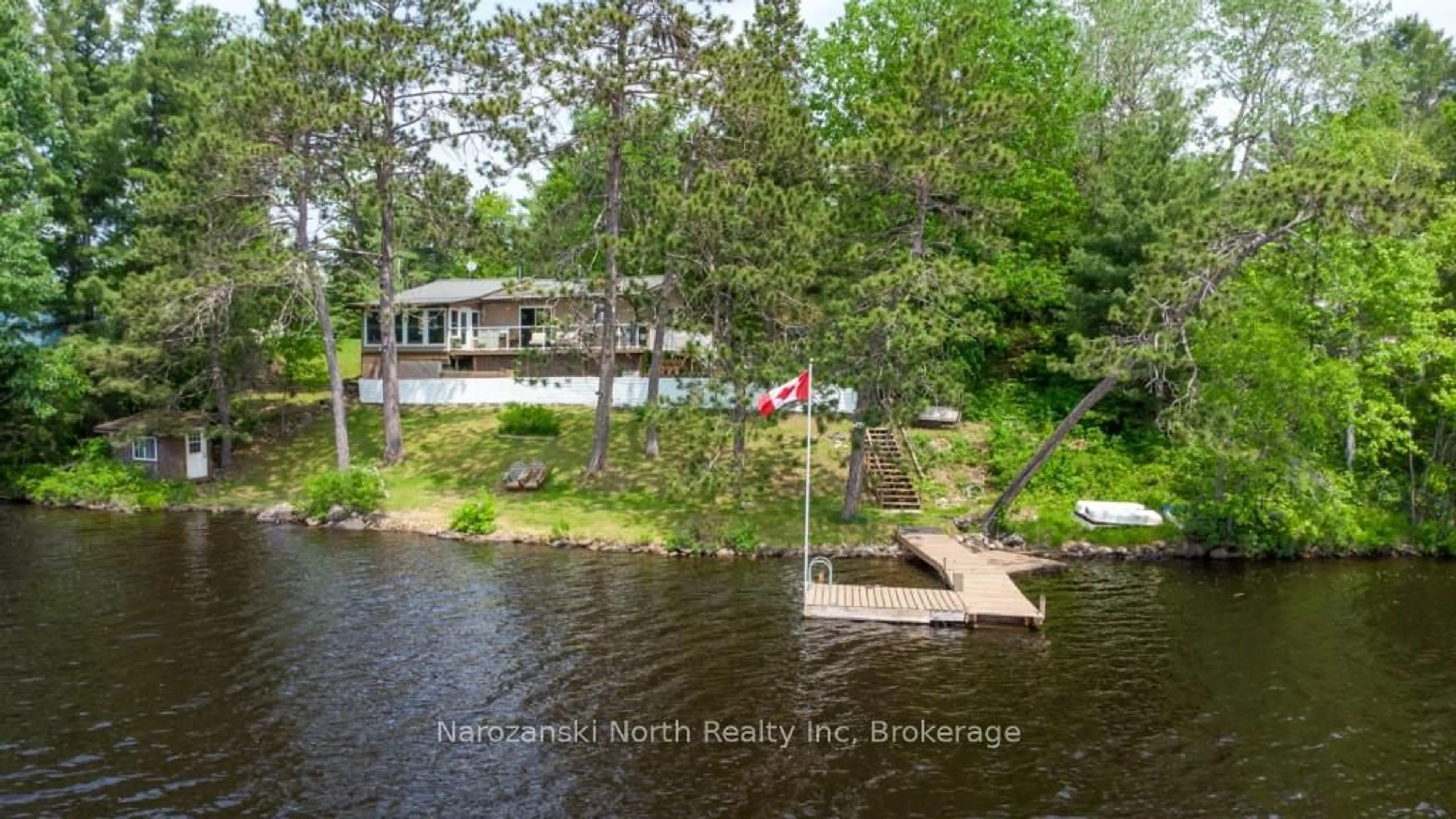 A pic from outside/outdoor area/front of a property/back of a property/a pic from drone, water/lake/river/ocean view for 1893 Musky Bay Rd, St. Charles Ontario P0M 2W0