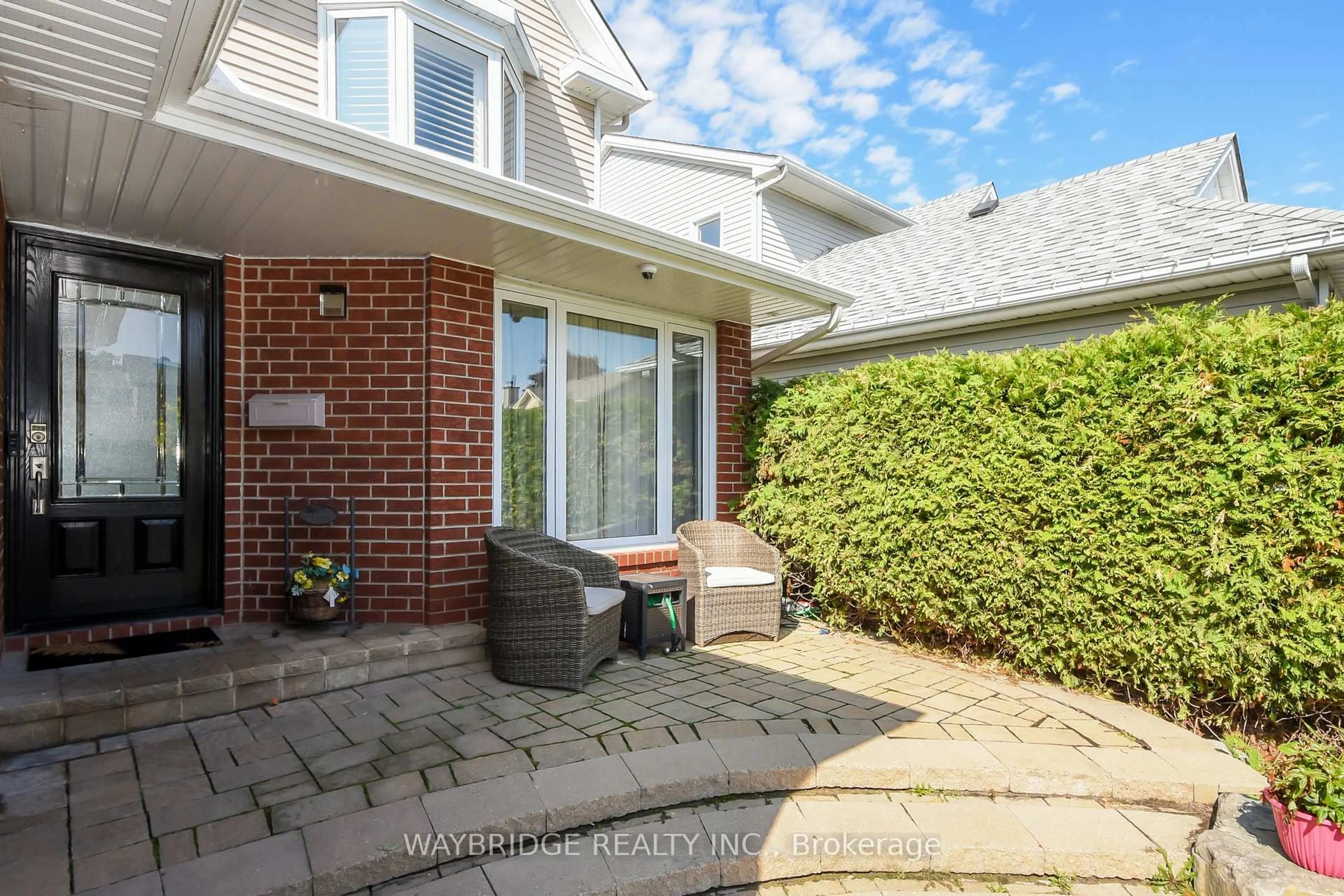 Home with brick exterior material, street for 27 Chatham Gdns, Barrhaven Ontario K2J 3M2