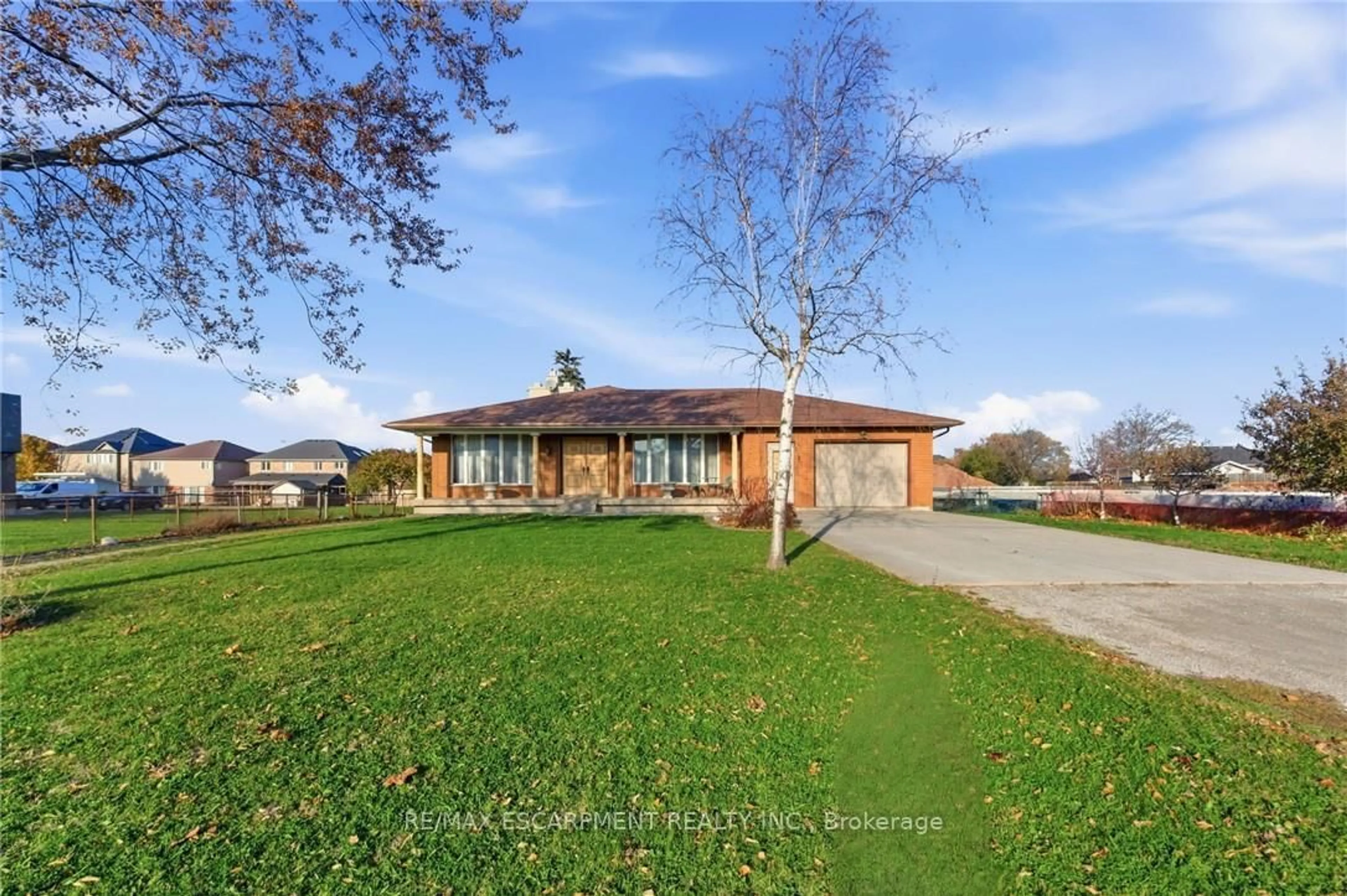 A pic from outside/outdoor area/front of a property/back of a property/a pic from drone, street for 1235 Barton St, Hamilton Ontario L8E 5G9