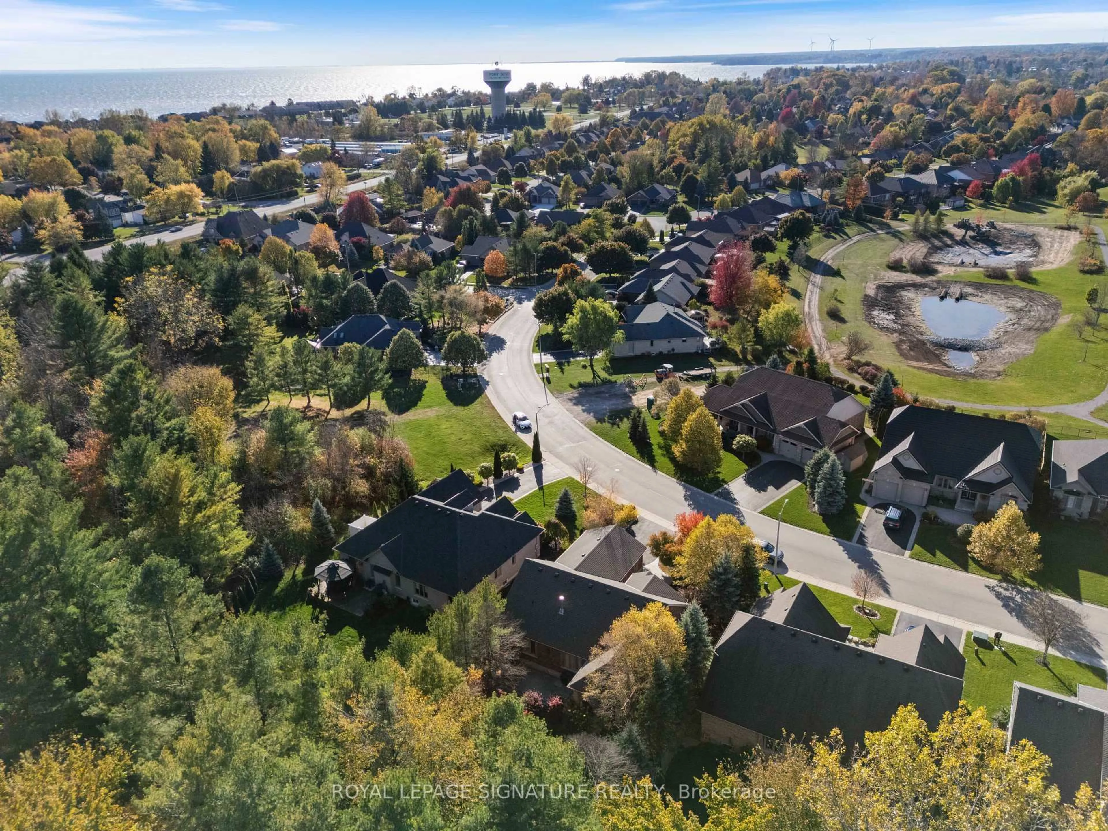 A pic from outside/outdoor area/front of a property/back of a property/a pic from drone, street for 64 Newport Lane, Norfolk Ontario N0A 1N7
