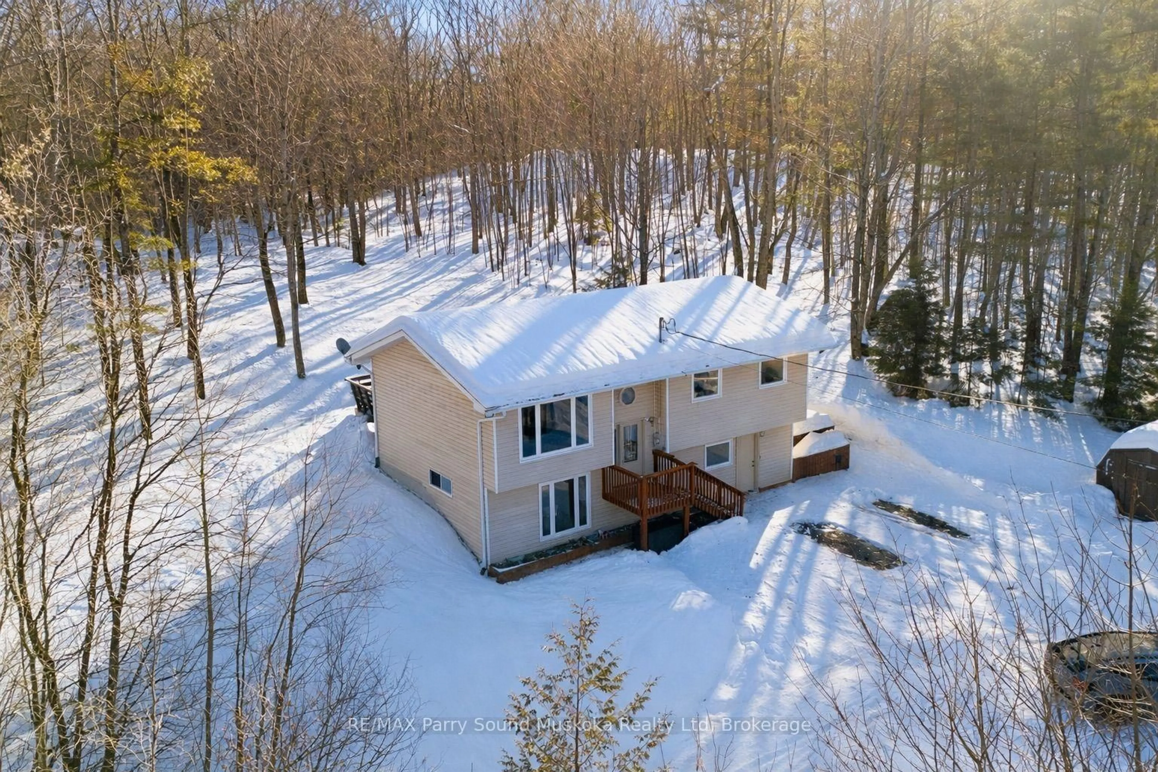 A pic from outside/outdoor area/front of a property/back of a property/a pic from drone, forest/trees view for 435 Rankin Lake Rd, Seguin Ontario P2A 0B2