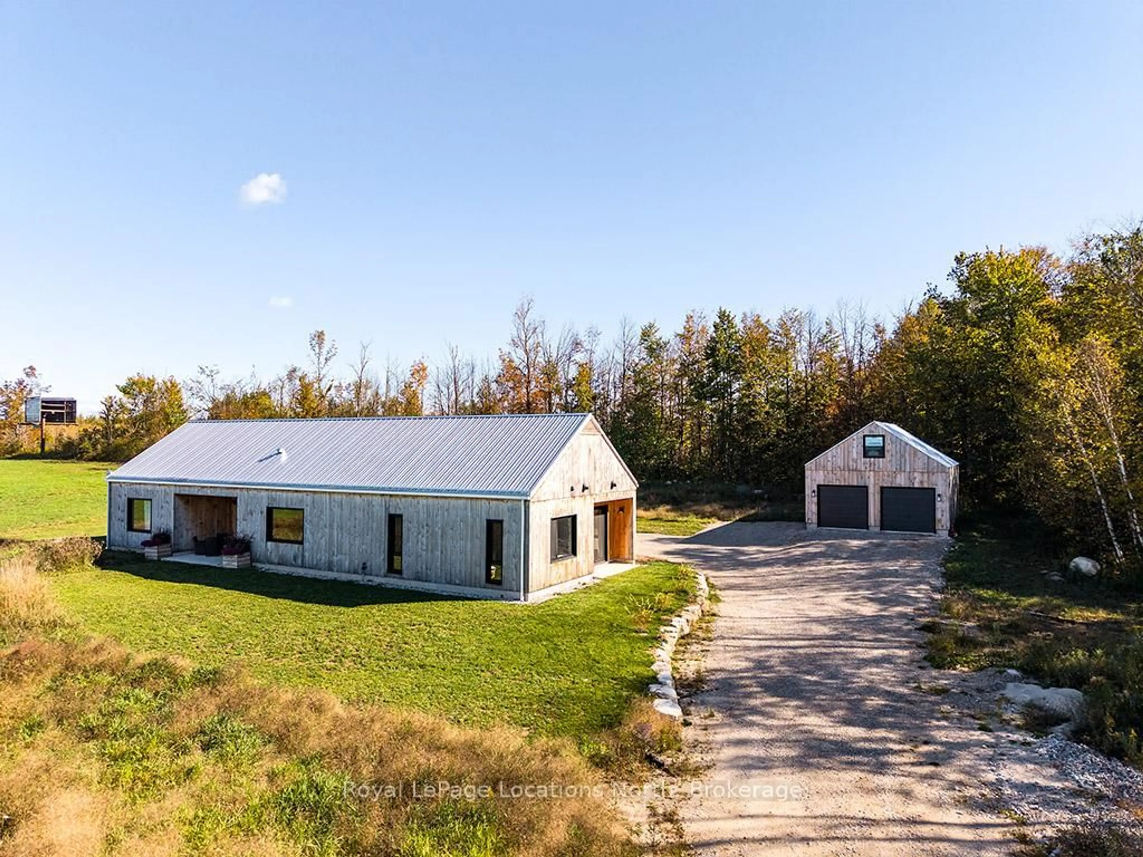 A pic from outside/outdoor area/front of a property/back of a property/a pic from drone, building for 58165 12th Line, Meaford Ontario N4L 1W5