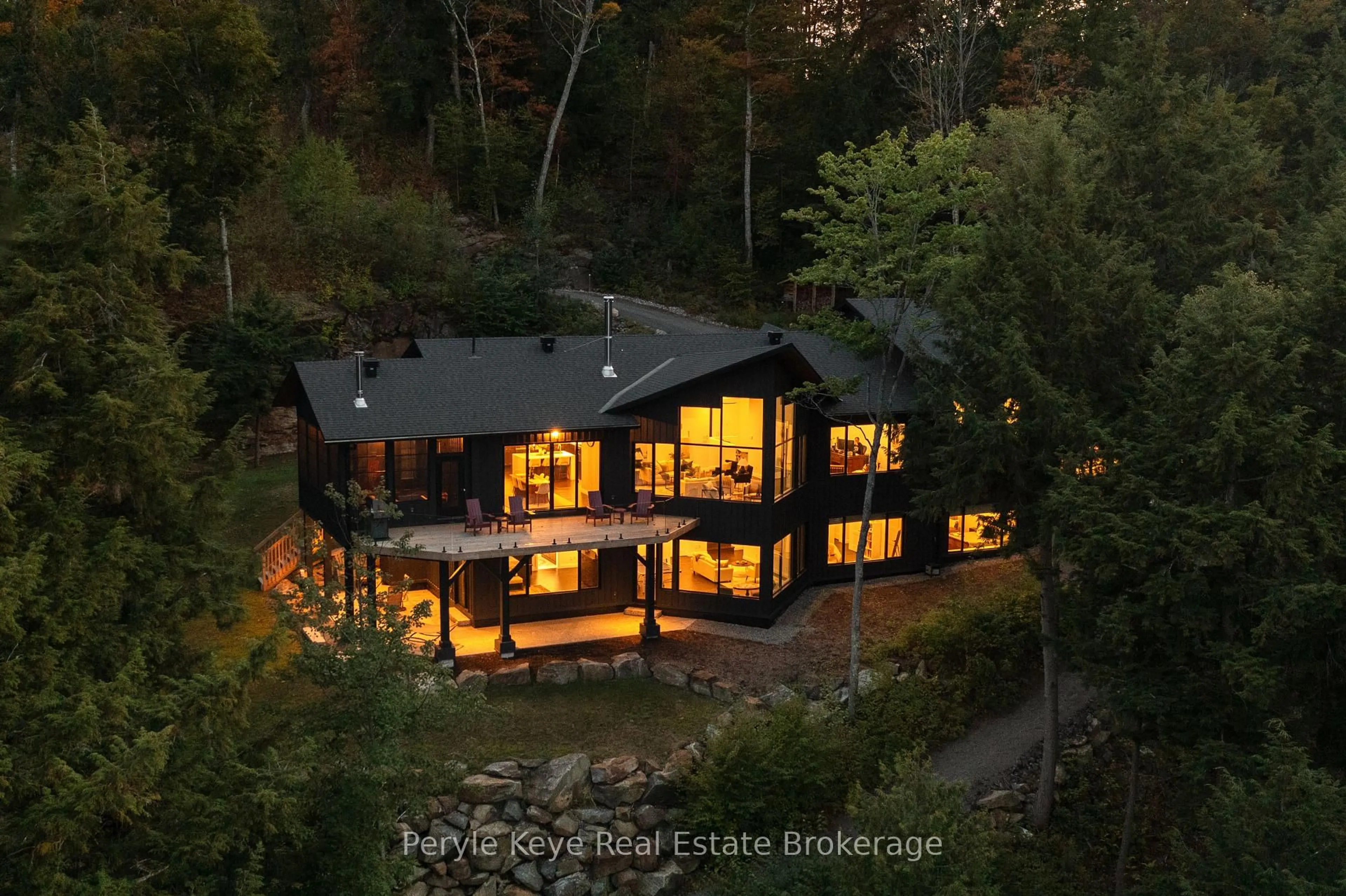 A pic from outside/outdoor area/front of a property/back of a property/a pic from drone, water/lake/river/ocean view for 86 Claren Cres, Huntsville Ontario P1H 0C3