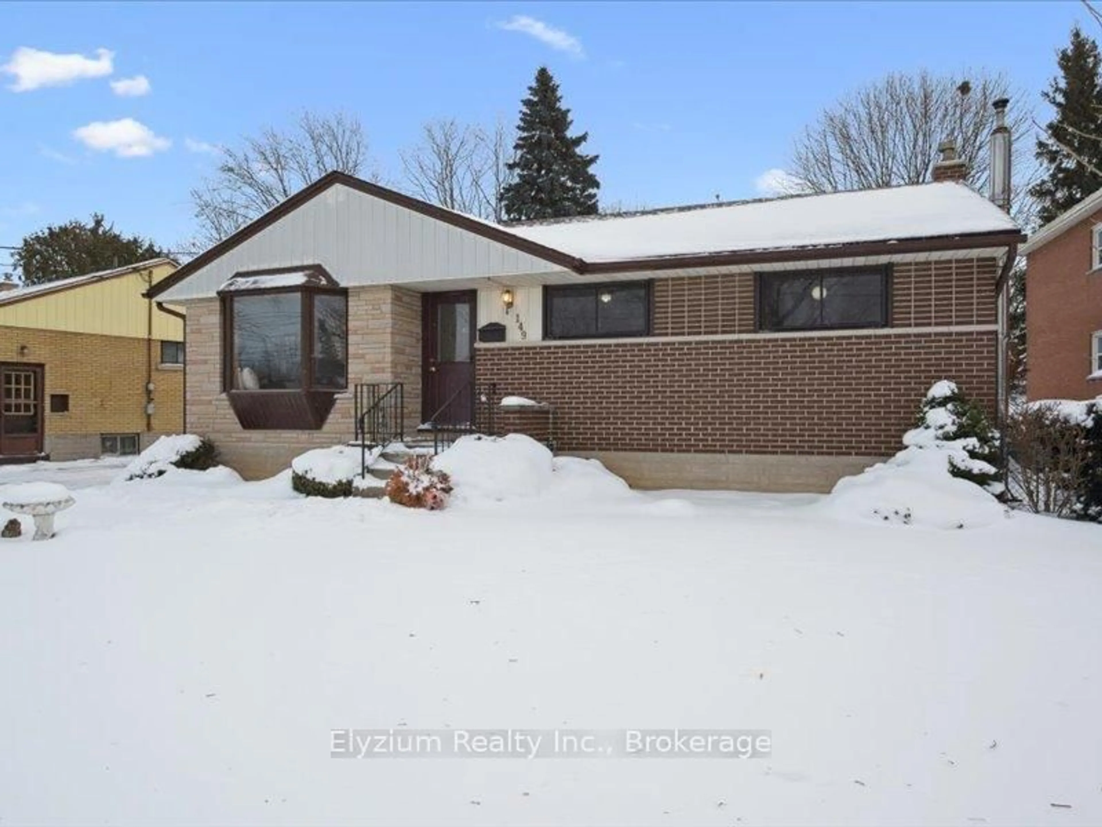 Home with brick exterior material, street for 149 Waverley Dr, Guelph Ontario N1E 1H1