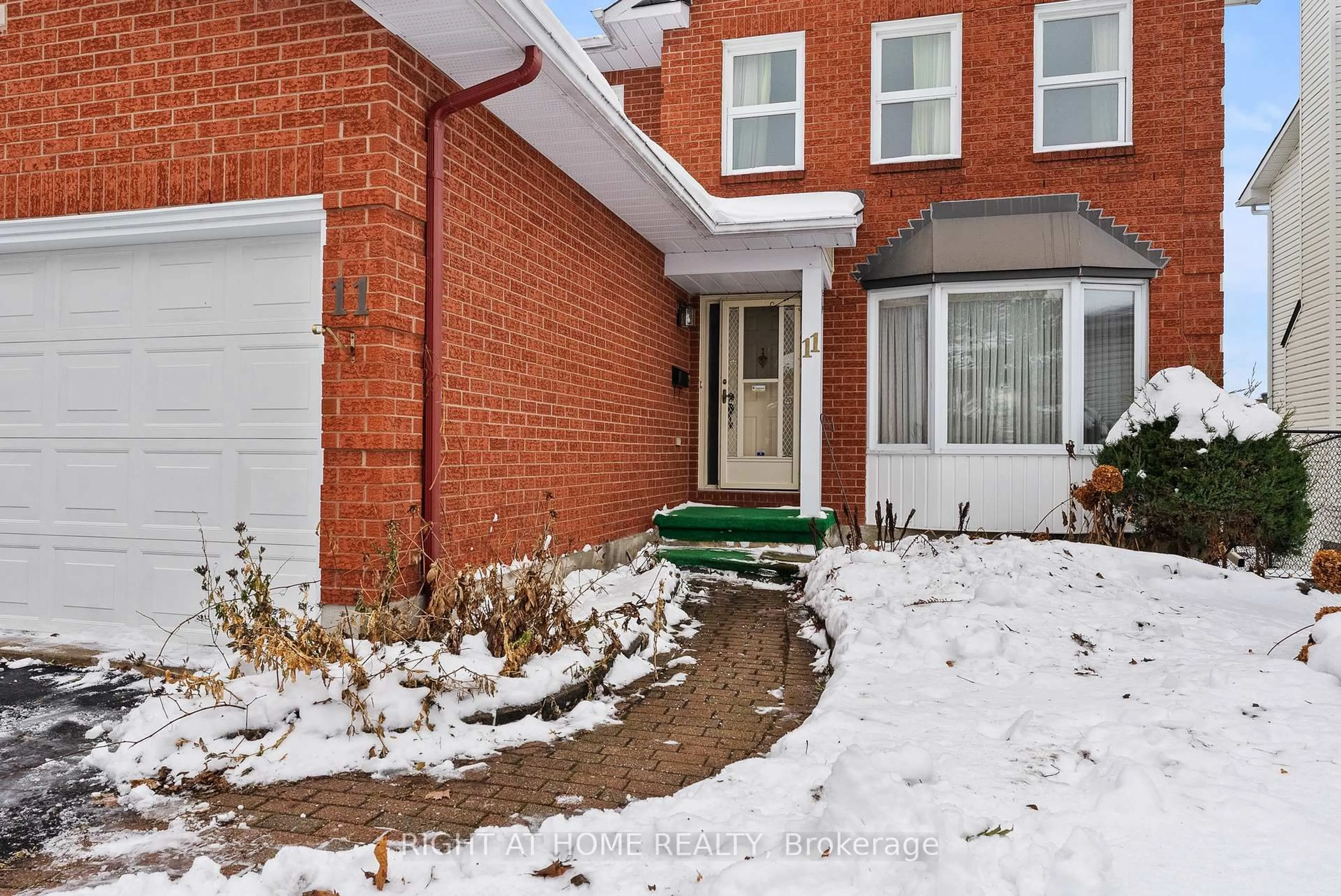 Home with brick exterior material, street for 11 Kluane Rdge, Kanata Ontario K2M 1Z7