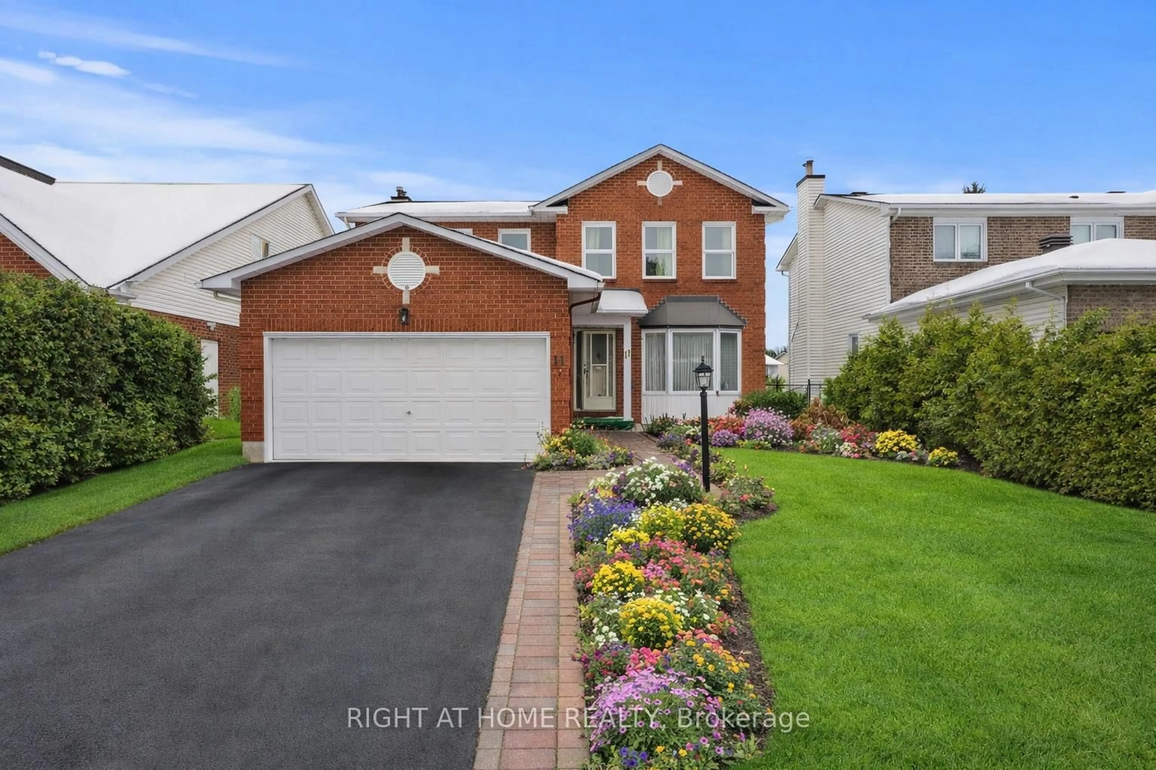 Home with brick exterior material, street for 11 Kluane Rdge, Kanata Ontario K2M 1Z7