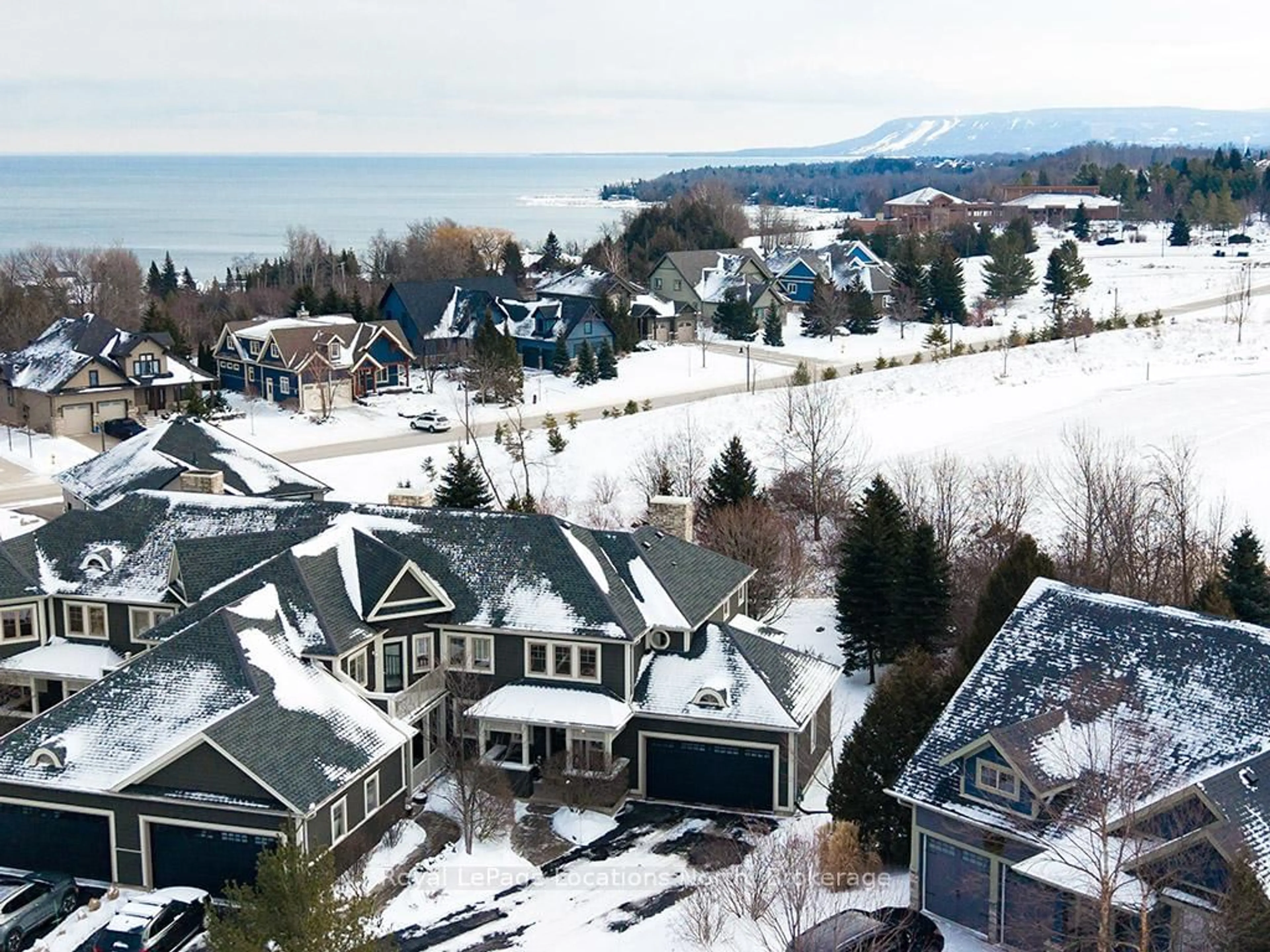 A pic from outside/outdoor area/front of a property/back of a property/a pic from drone, unknown for 108 Landry Lane #1, Blue Mountains Ontario N0H 2P0