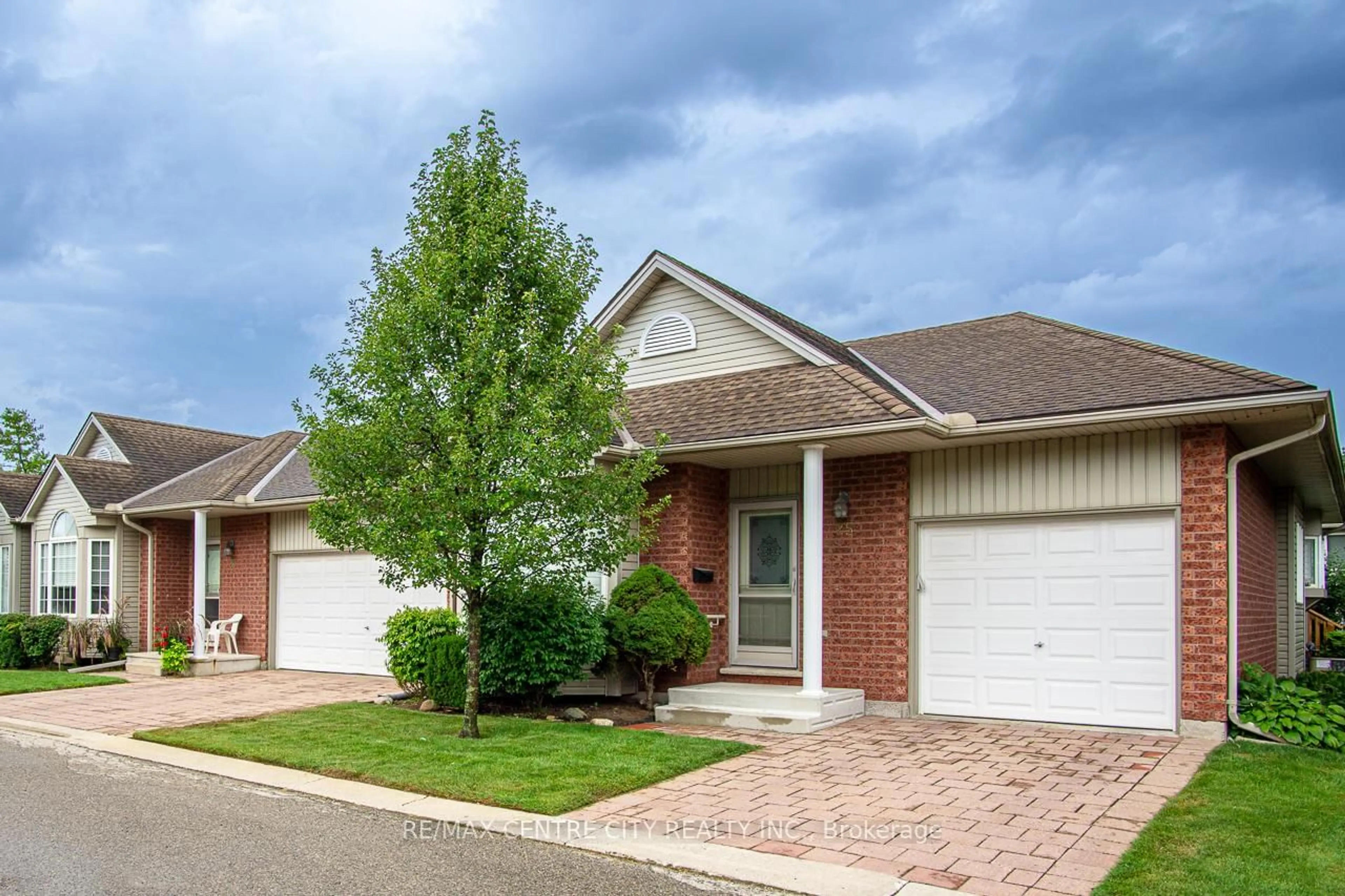 Home with brick exterior material, street for 1555 Highbury Ave #25, London East Ontario N5Y 5R2