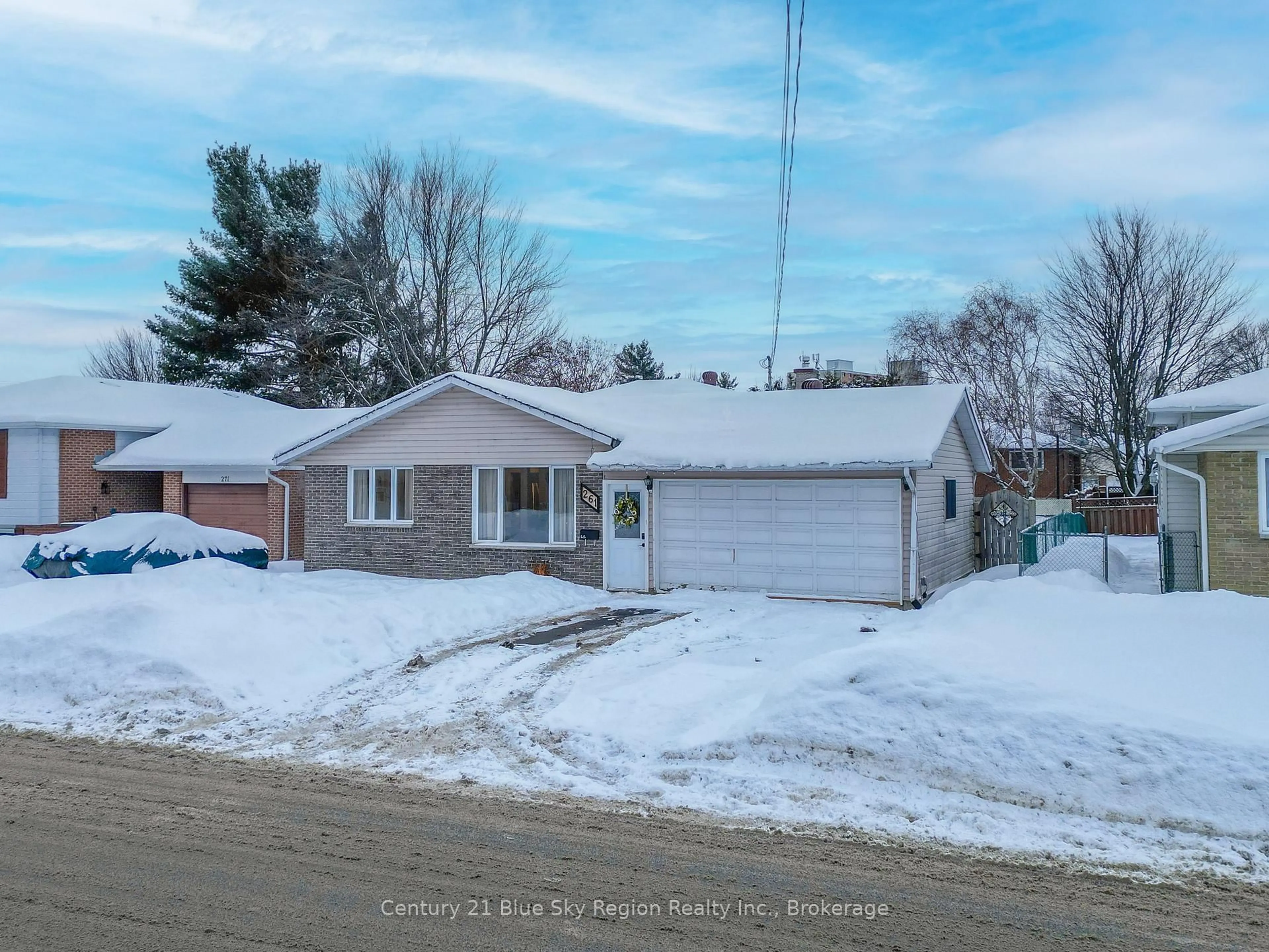 A pic from outside/outdoor area/front of a property/back of a property/a pic from drone, street for 261 Mulligan St, North Bay Ontario P1A 3P4