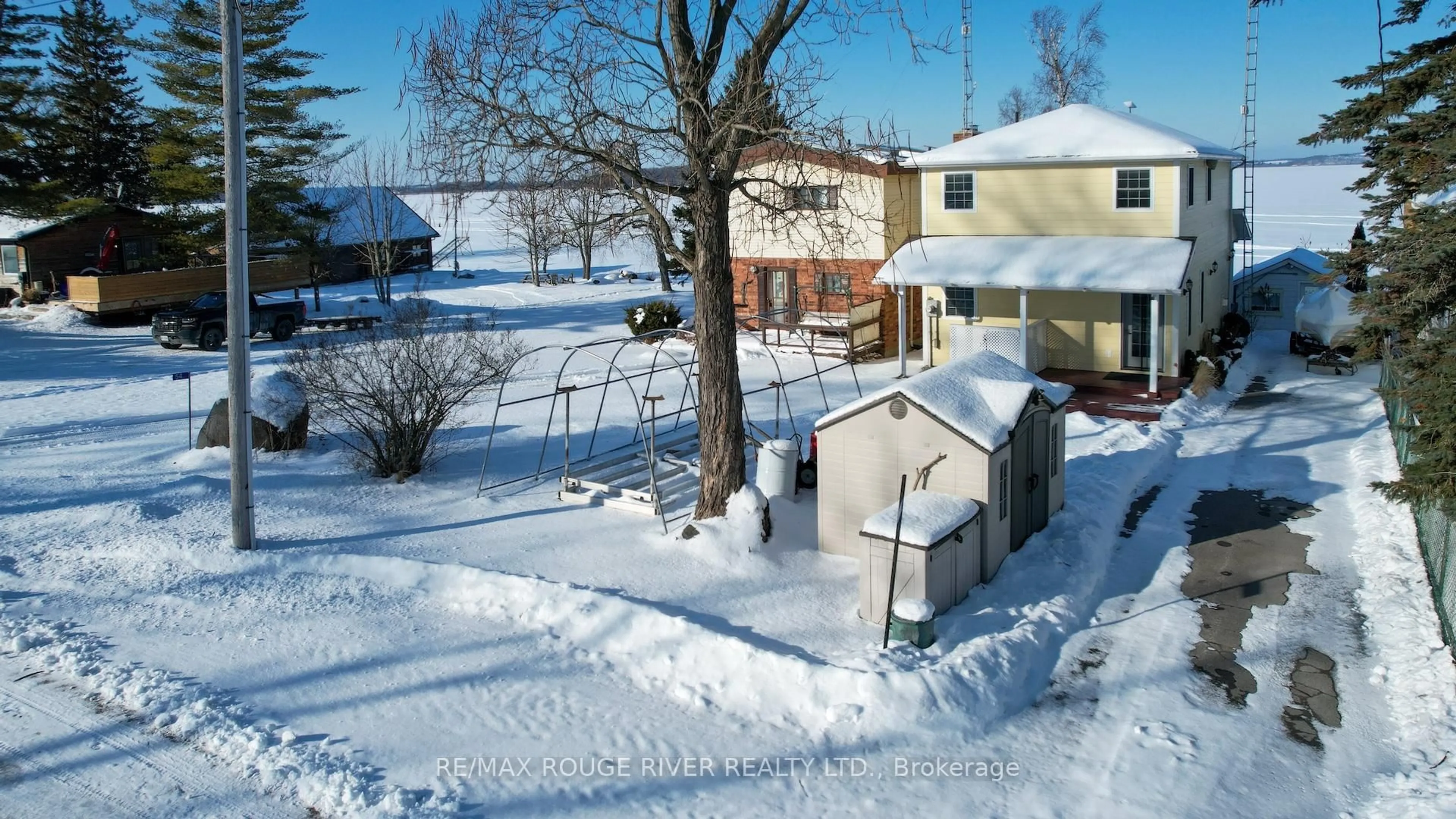 A pic from outside/outdoor area/front of a property/back of a property/a pic from drone, street for 6108 Curtis Point Rd #55, Alnwick/Haldimand Ontario K0K 2X0