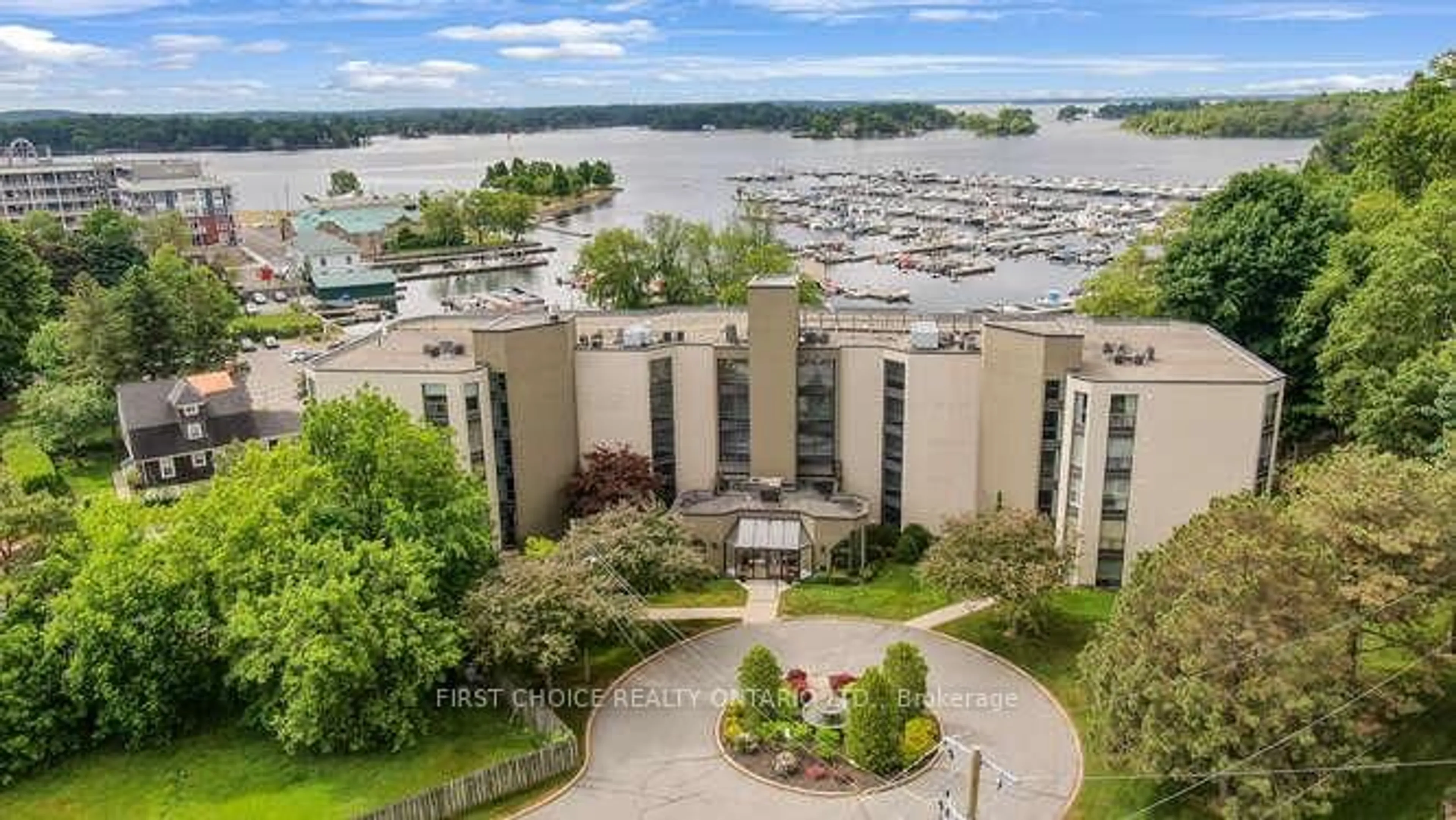 A pic from outside/outdoor area/front of a property/back of a property/a pic from drone, water/lake/river/ocean view for 50 Market St St #203, Gananoque Ontario K7G 2M3