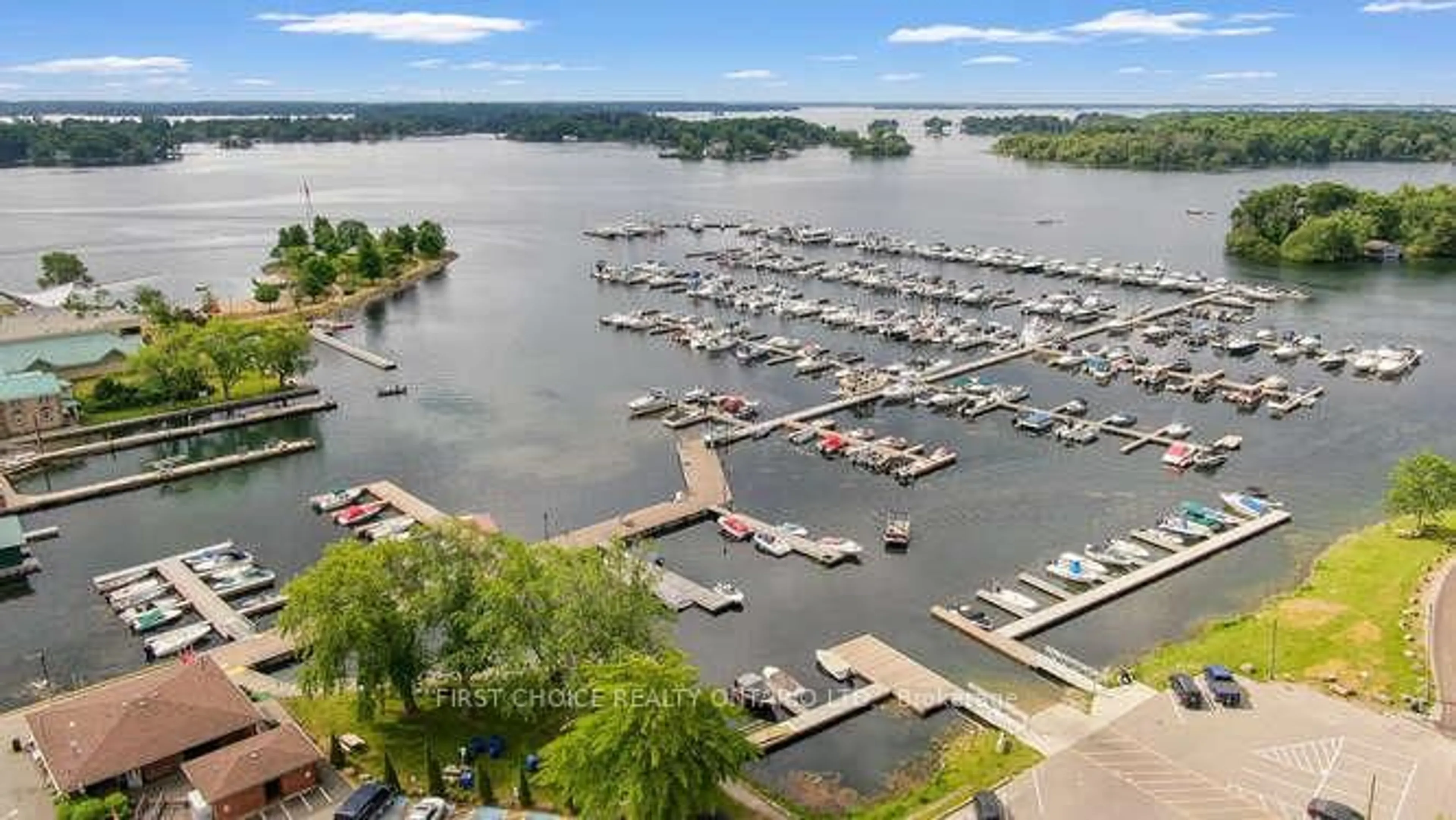 A pic from outside/outdoor area/front of a property/back of a property/a pic from drone, water/lake/river/ocean view for 50 Market St St #203, Gananoque Ontario K7G 2M3