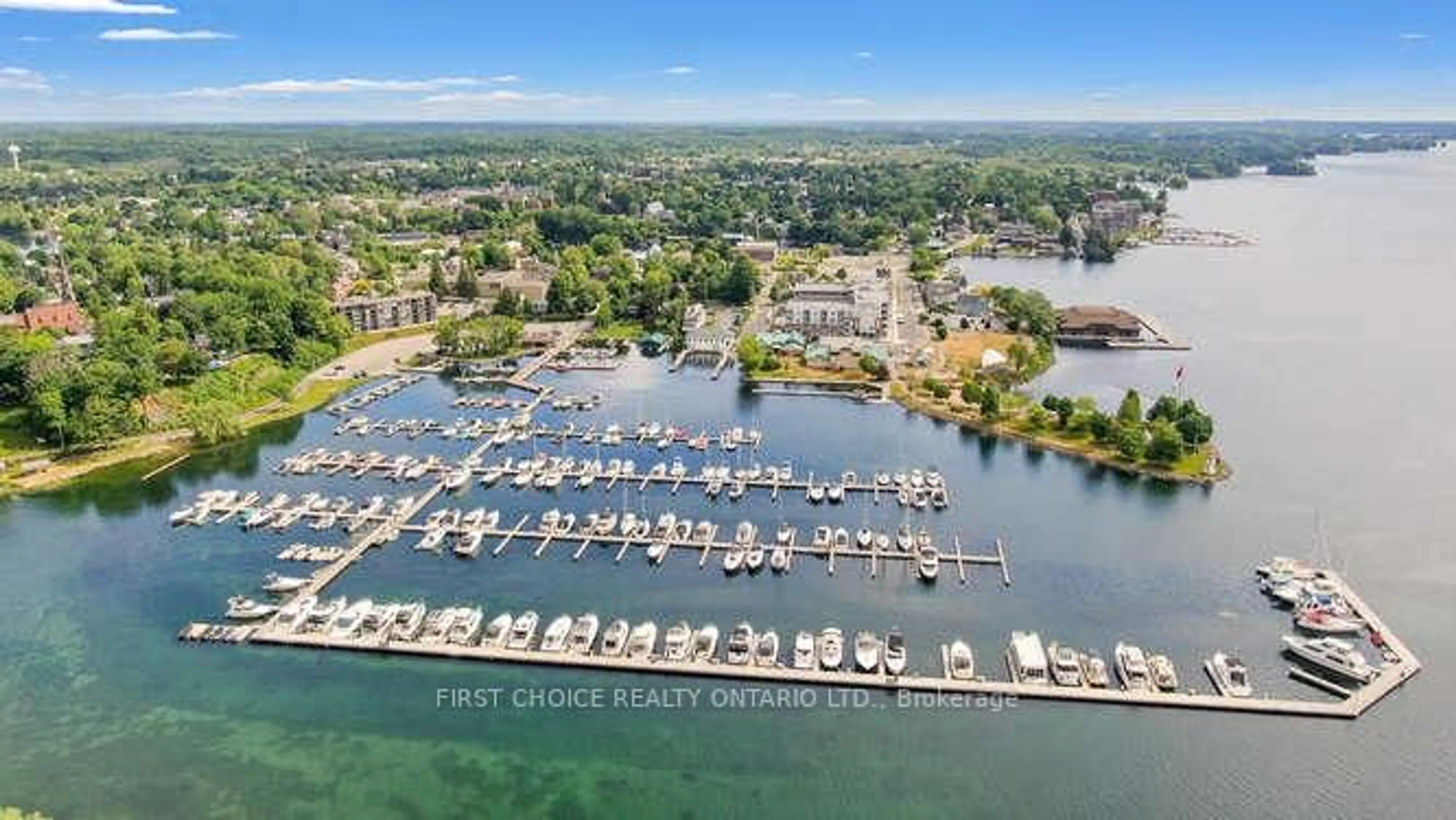 A pic from outside/outdoor area/front of a property/back of a property/a pic from drone, water/lake/river/ocean view for 50 Market St St #203, Gananoque Ontario K7G 2M3