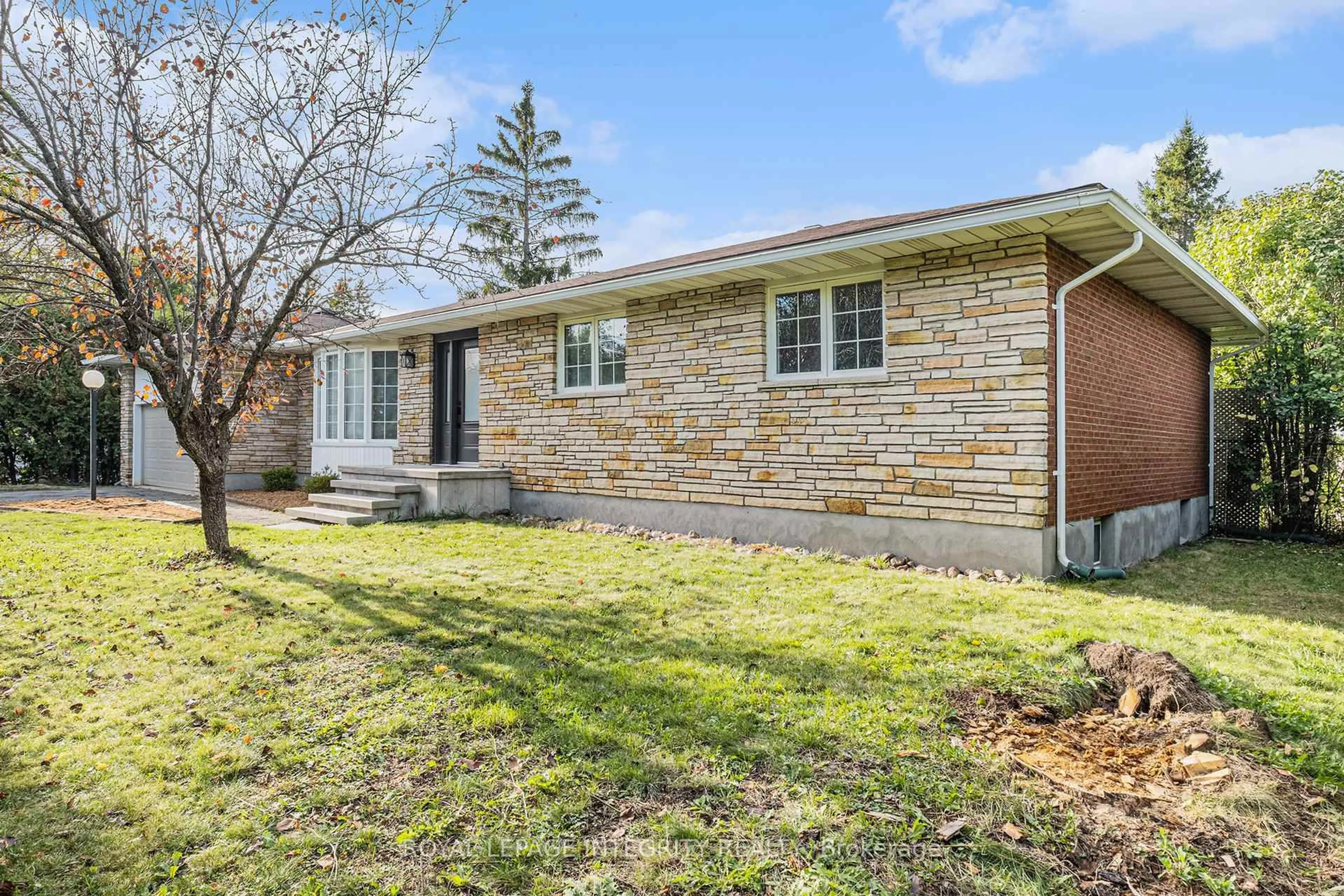 Home with brick exterior material, street for 1843 Rideau Rd, Ottawa Ontario K1X 1E1