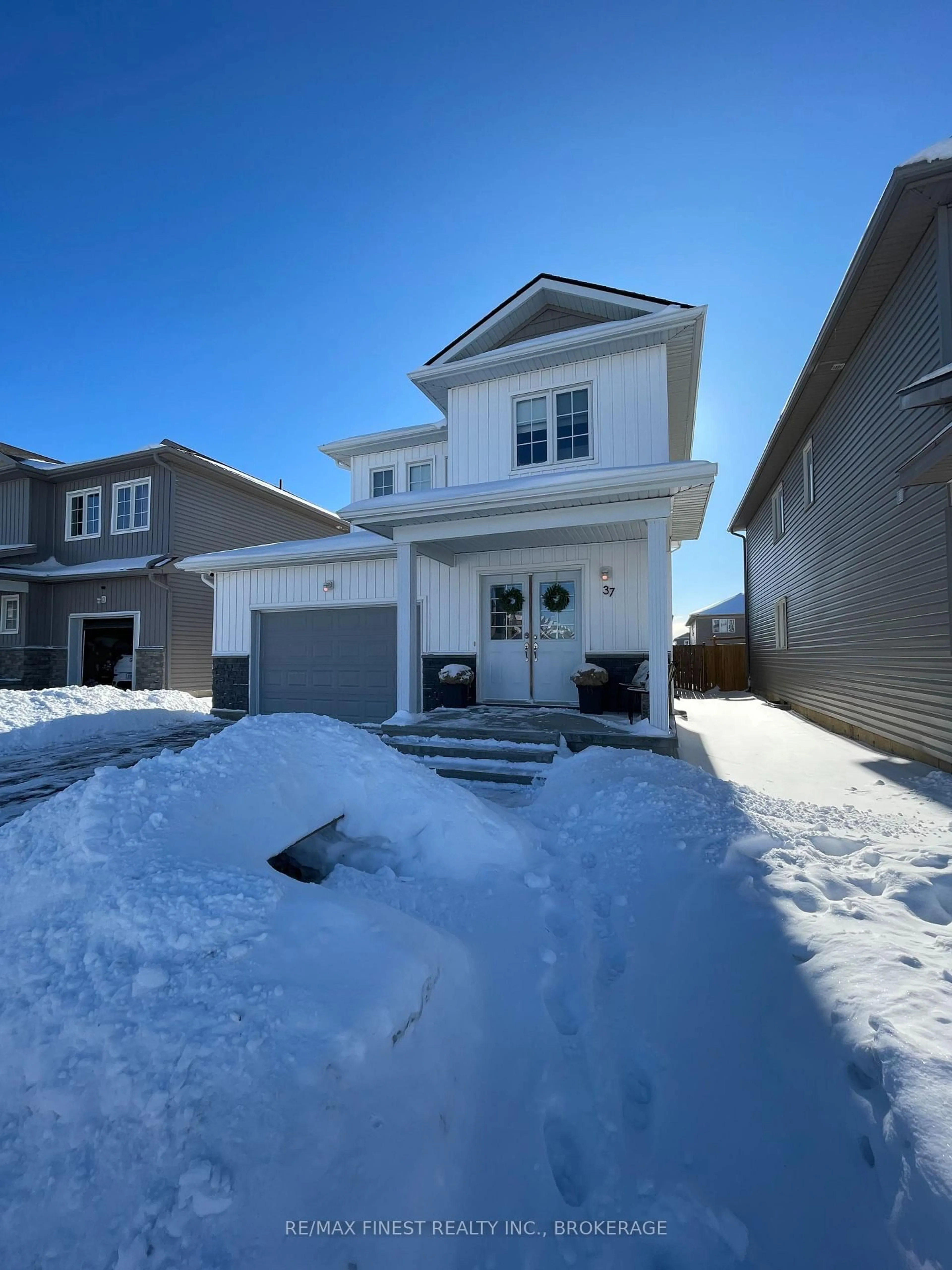 A pic from outside/outdoor area/front of a property/back of a property/a pic from drone, street for 37 Brennan Cres, Bissett Creek Ontario K0H 2H0