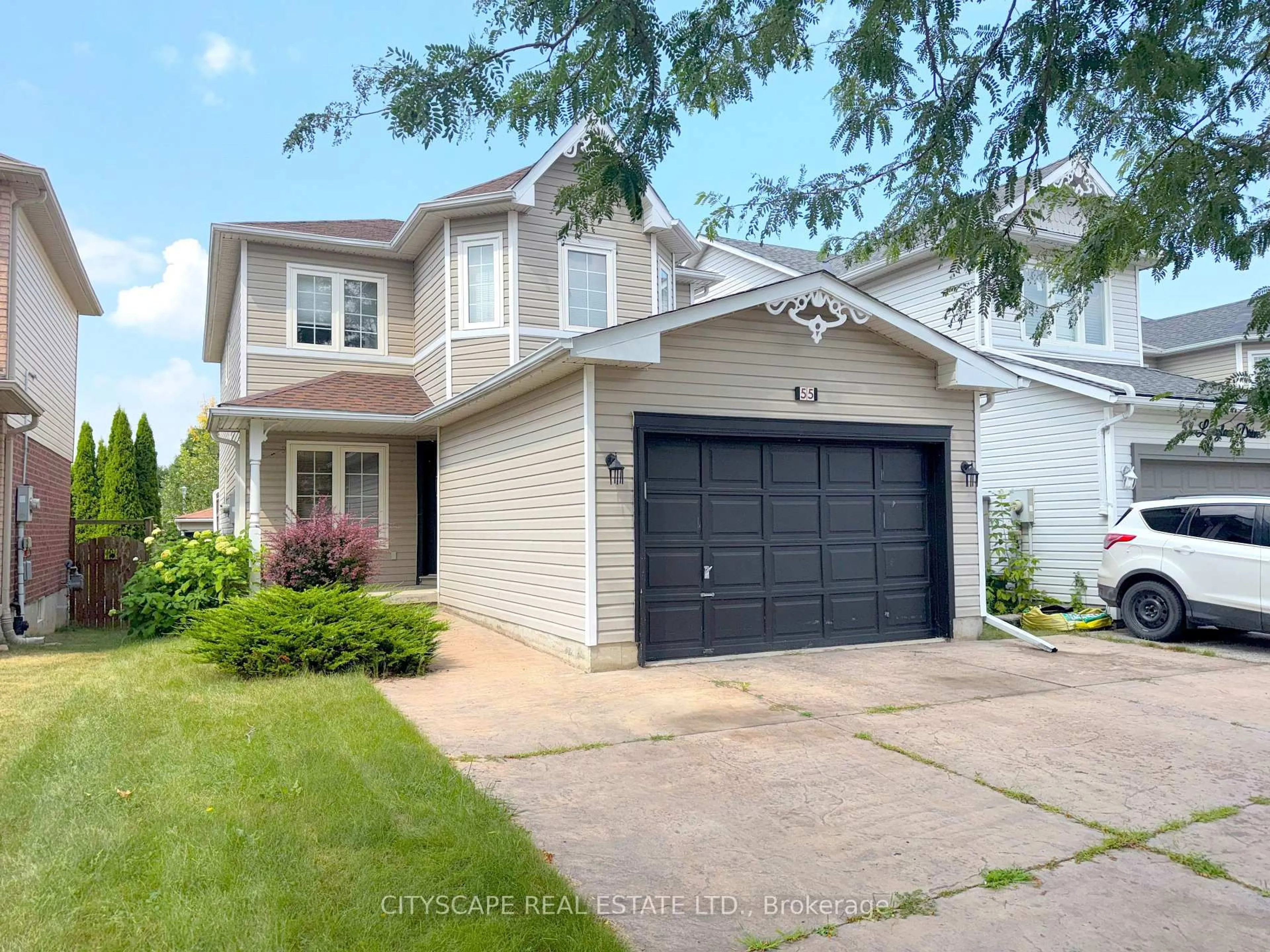 Home with vinyl exterior material, street for 55 Langlaw Dr, Cambridge Ontario N1P 1J1