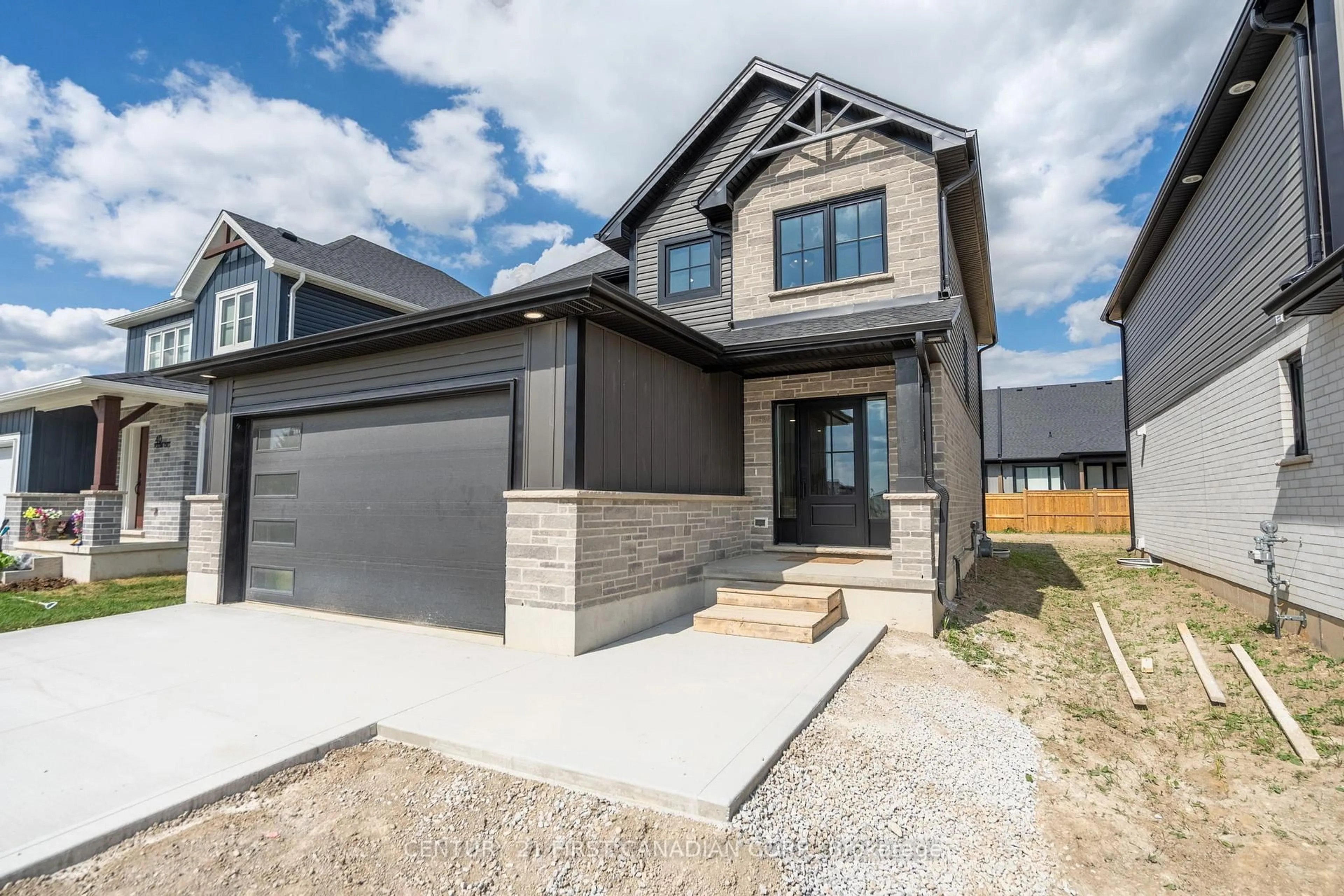 Home with brick exterior material, street for 5 Doerr Crt, North Middlesex Ontario N0M 1A0