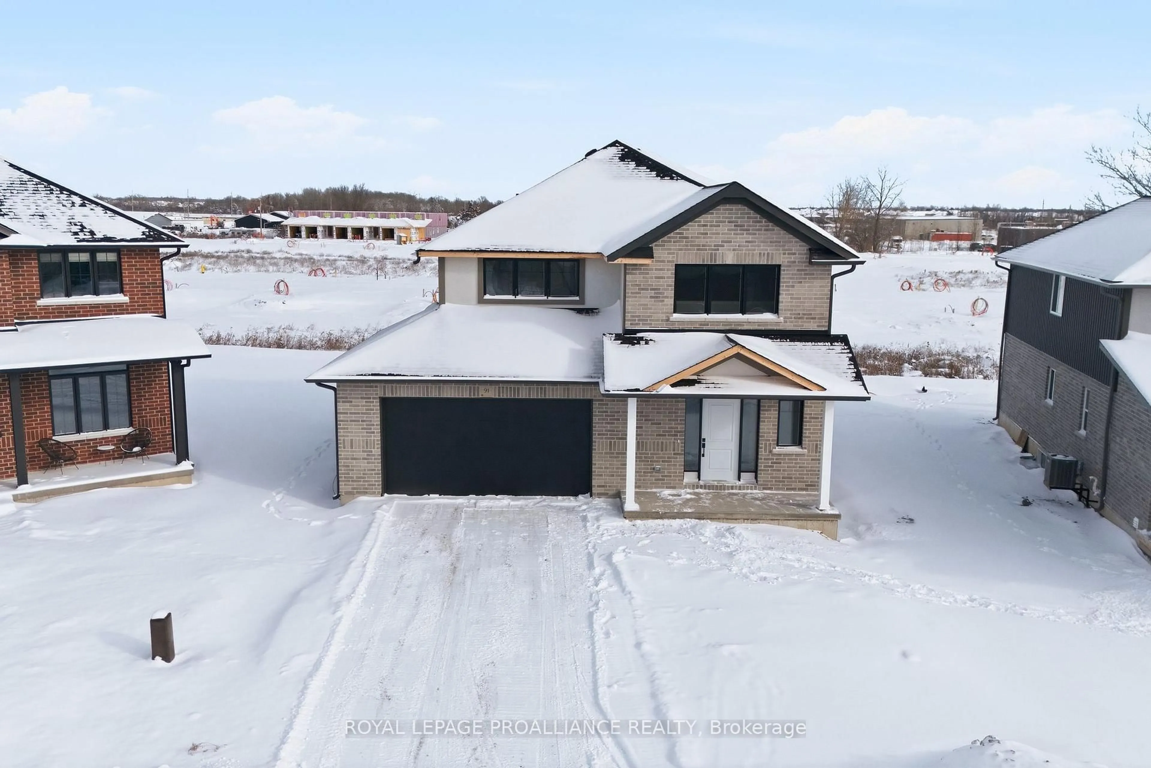 A pic from outside/outdoor area/front of a property/back of a property/a pic from drone, street for 91 Raycroft Dr, Belleville Ontario K8N 0R5