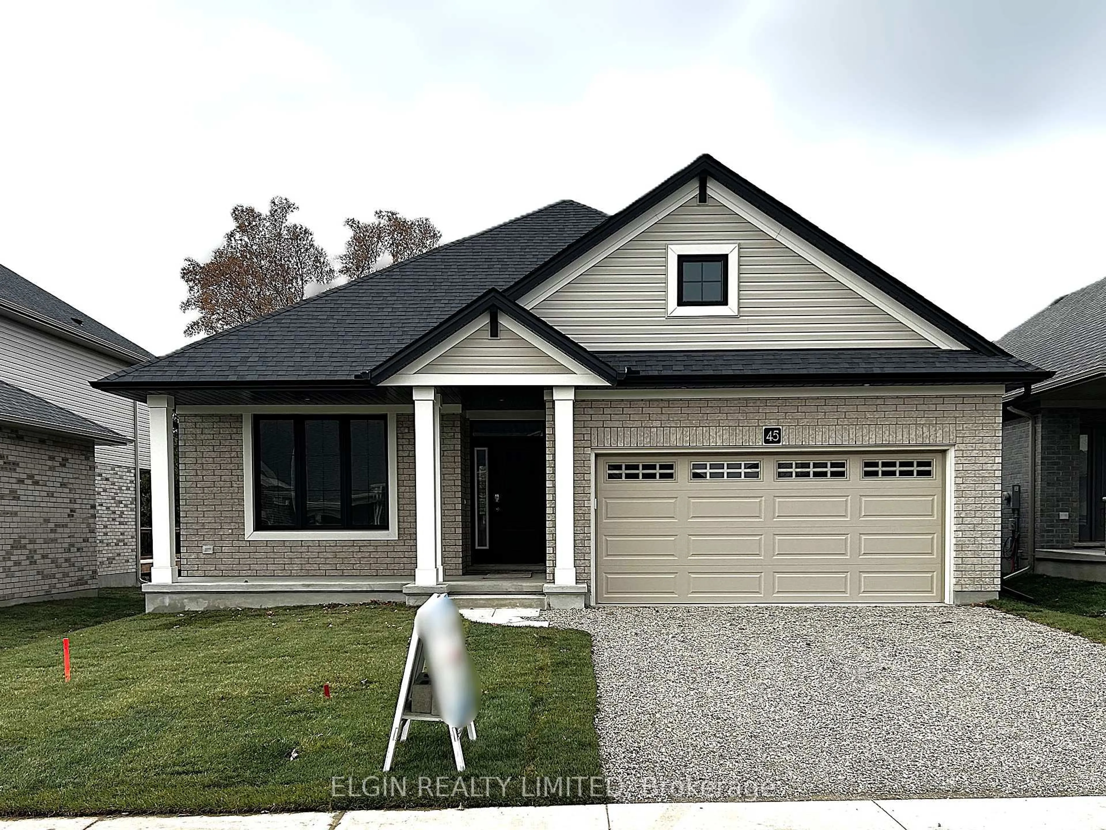 Home with vinyl exterior material, street for 45 Lark St, Tillsonburg Ontario N4G 0K8