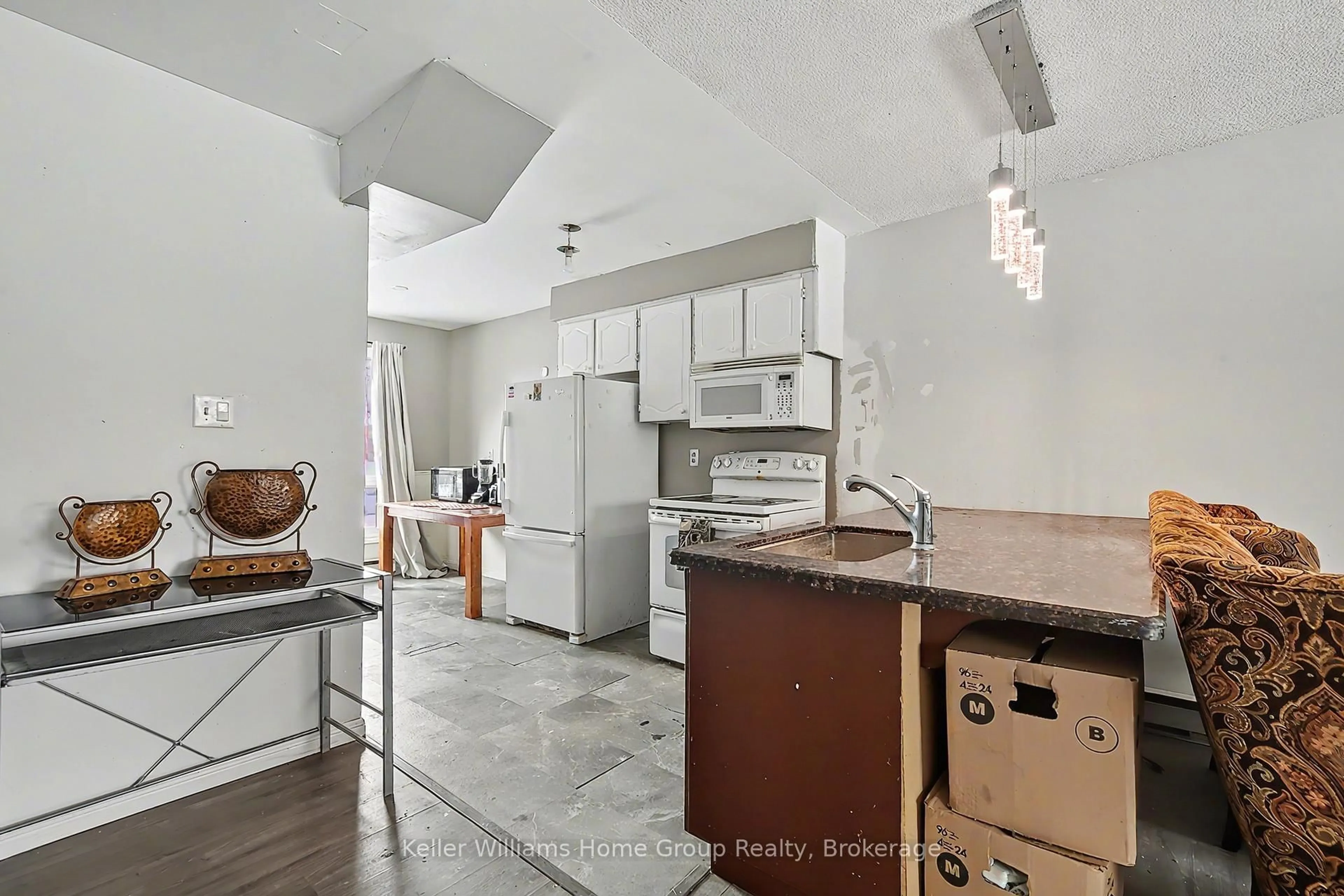 Open concept kitchen, ceramic/tile floor for 49 Rhonda Rd #66, Guelph Ontario N1H 7A4