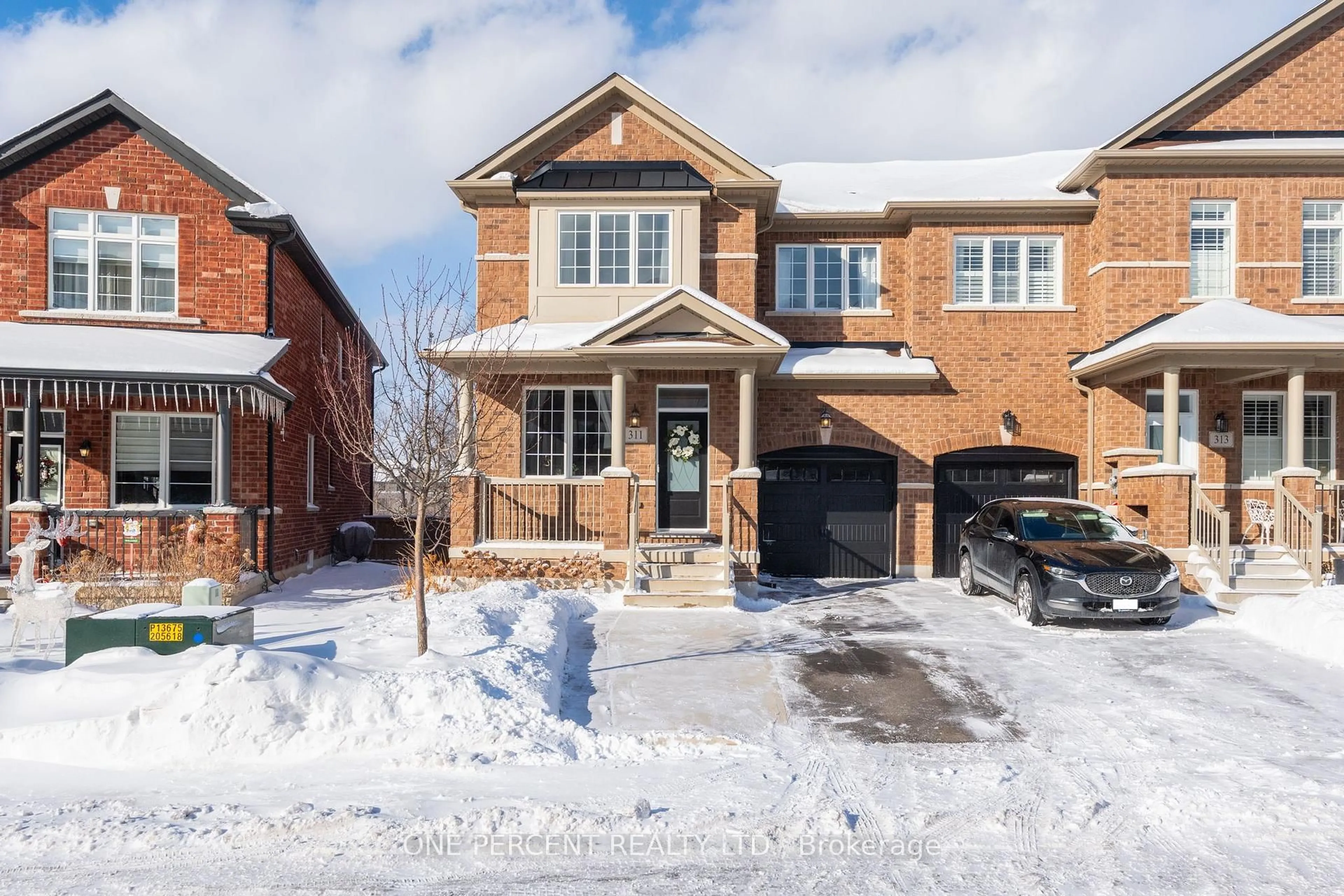 Home with brick exterior material, street for 311 Humphrey St, Hamilton Ontario L8B 1X4