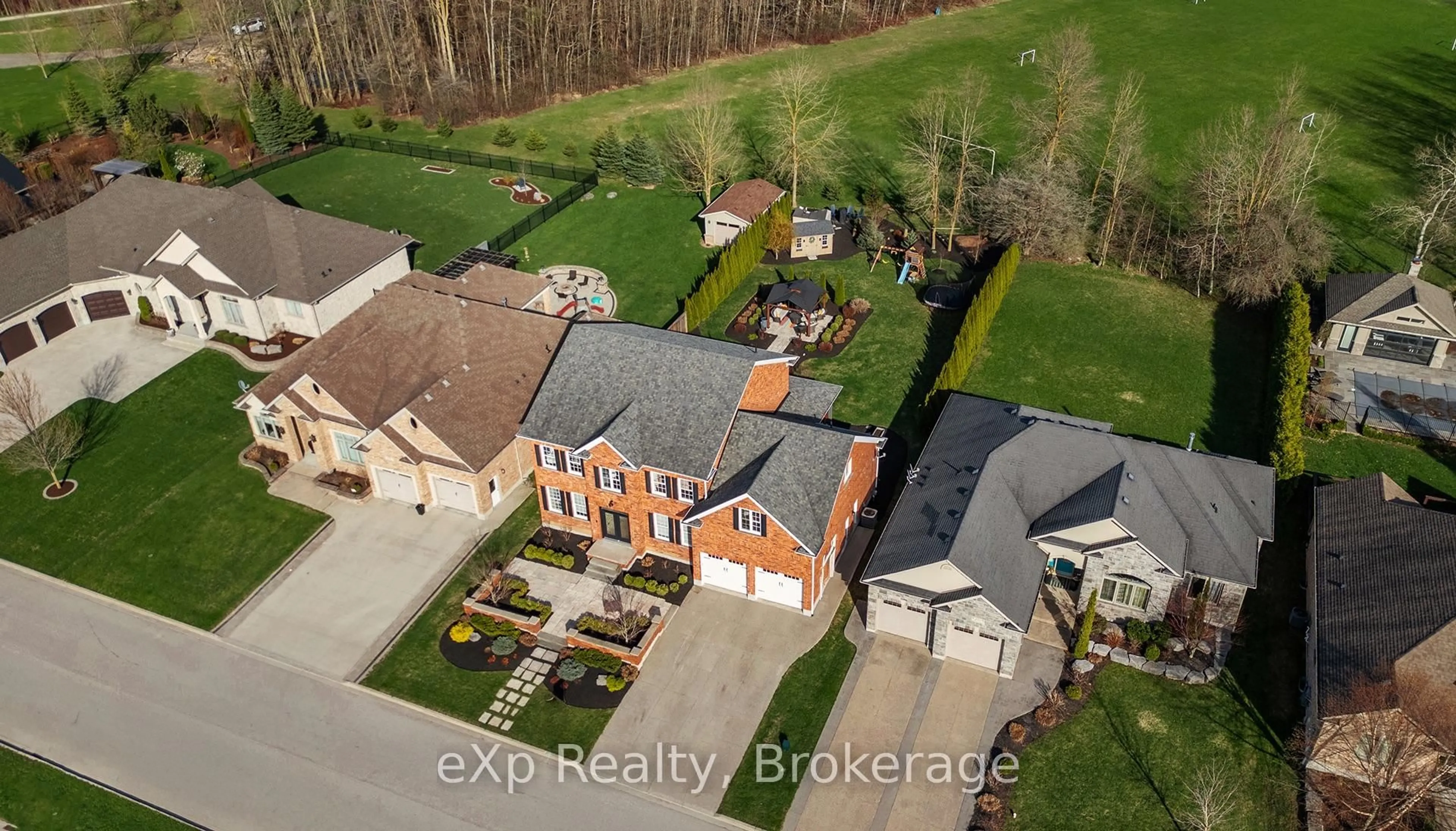 A pic from outside/outdoor area/front of a property/back of a property/a pic from drone, street for 880 Wood Dr, North Perth Ontario N4W 0B7