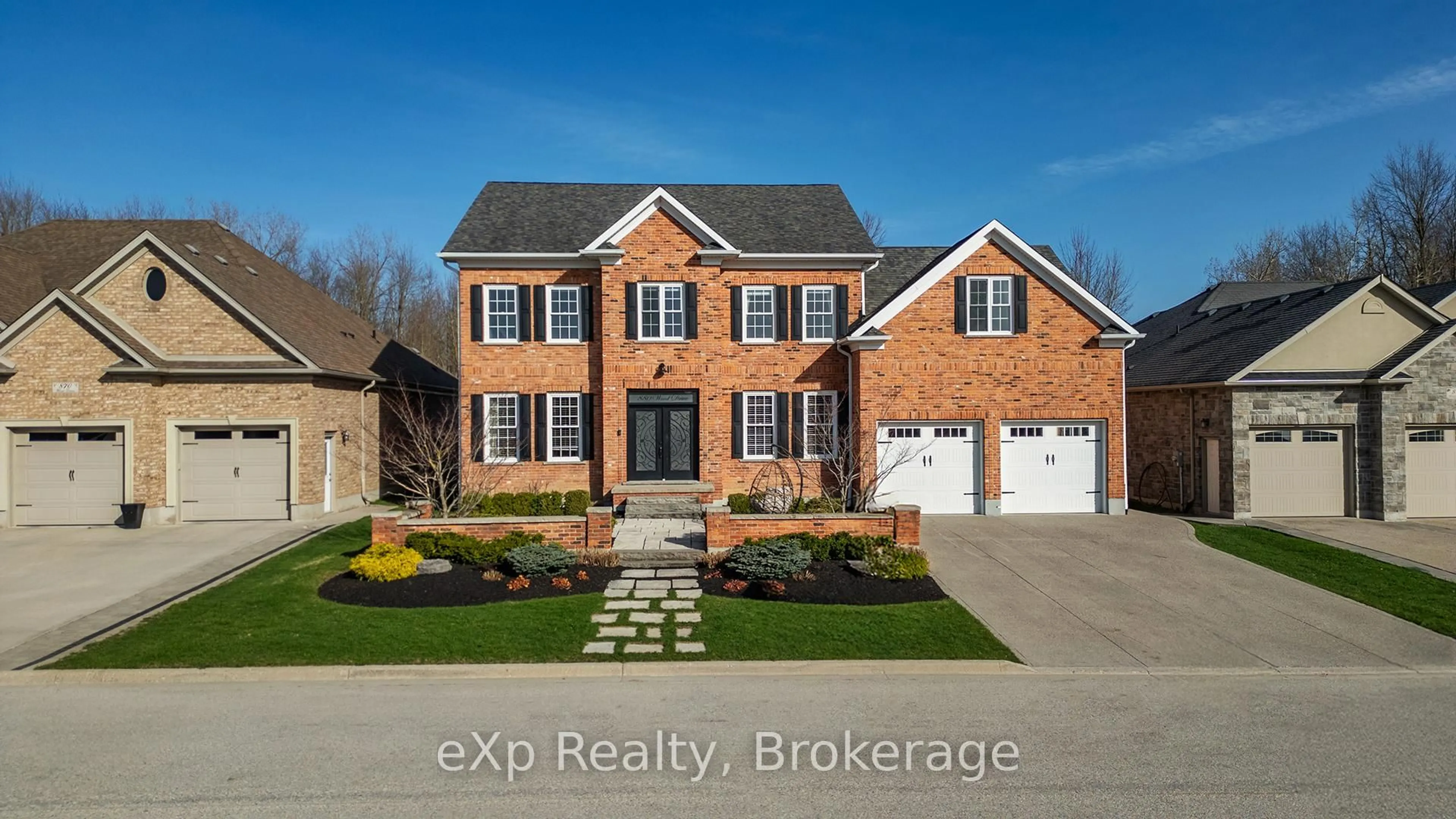 Home with brick exterior material, street for 880 Wood Dr, North Perth Ontario N4W 0B7