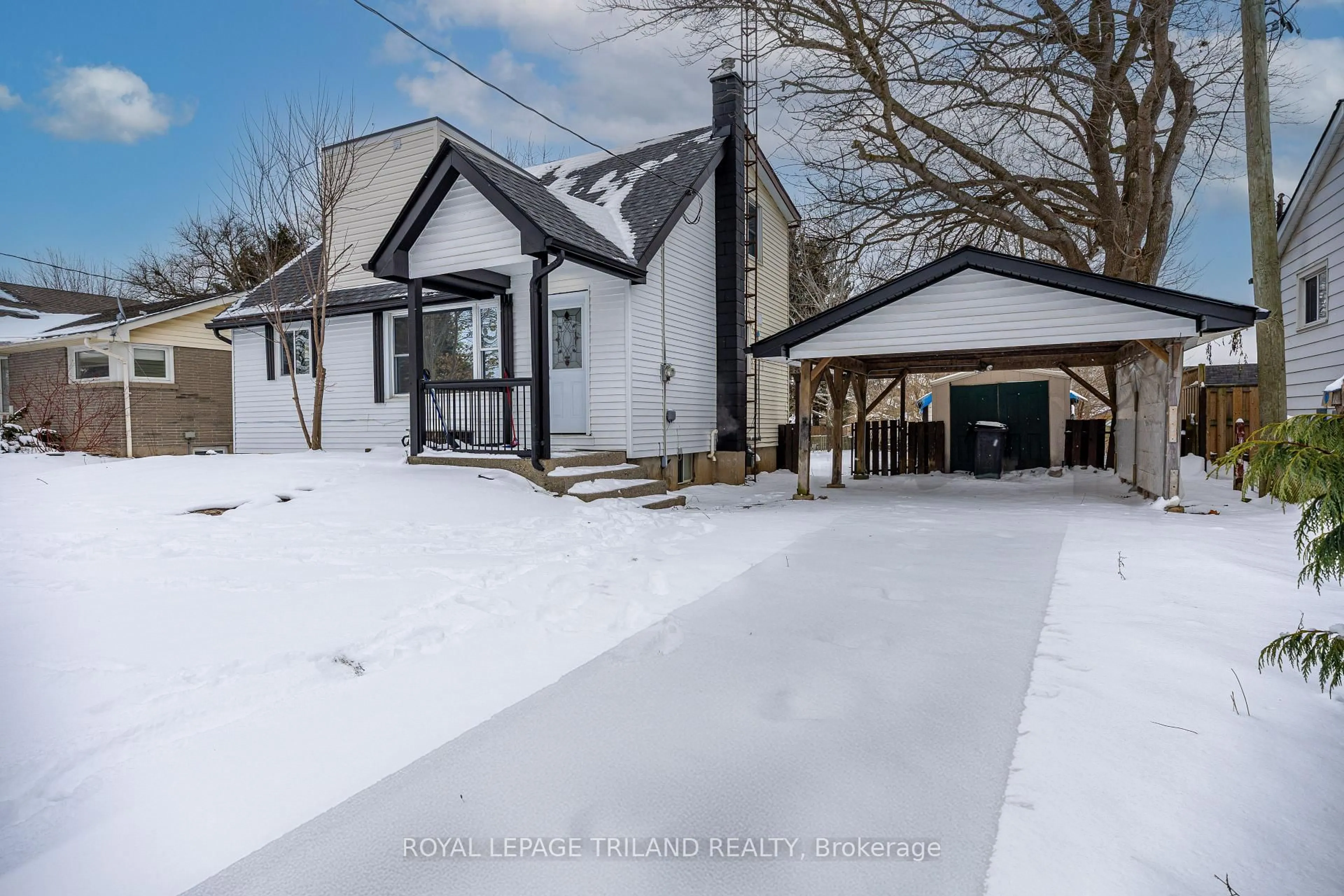 A pic from outside/outdoor area/front of a property/back of a property/a pic from drone, street for 1223 Sunningdale Rd, London North Ontario N5X 4B1