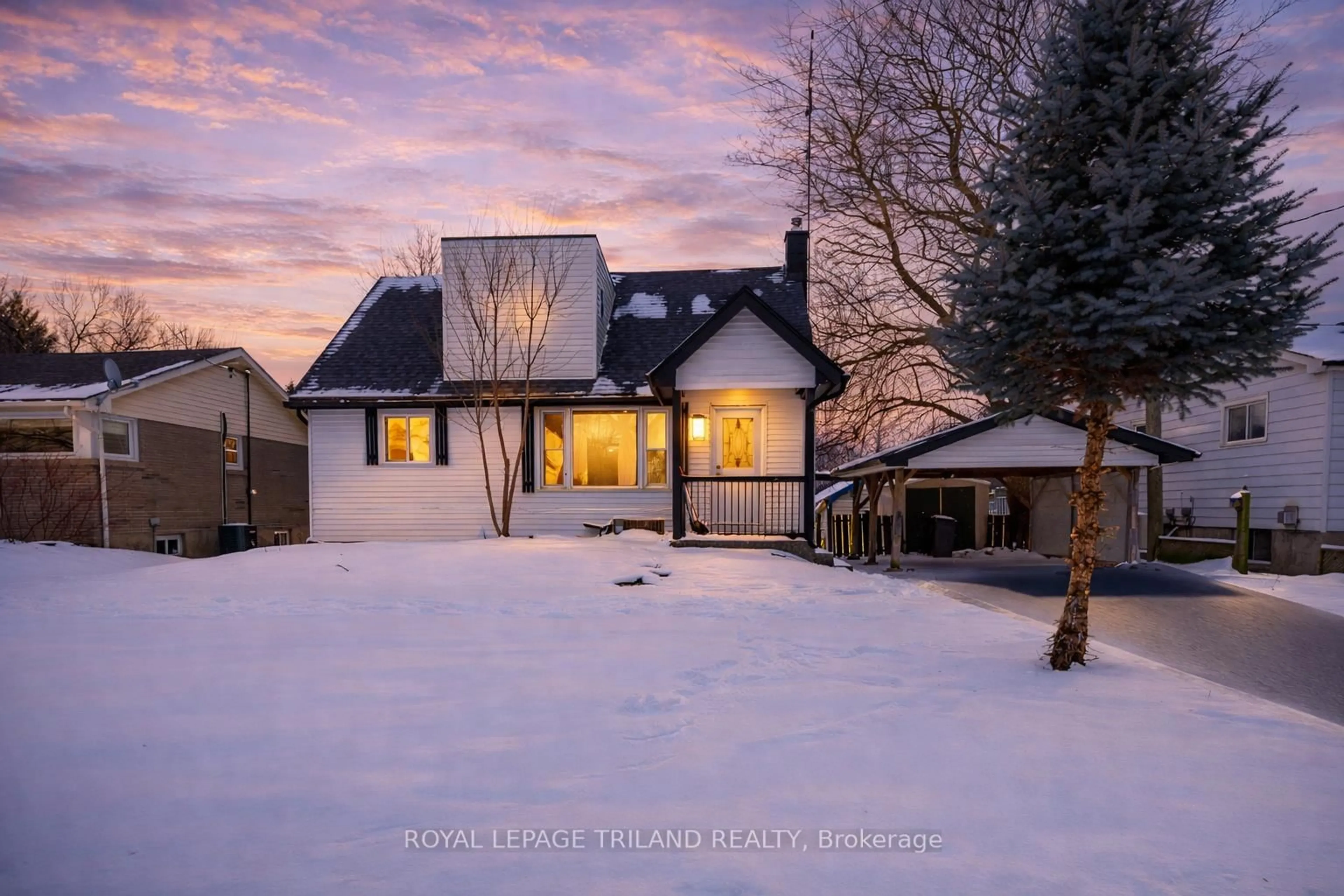 A pic from outside/outdoor area/front of a property/back of a property/a pic from drone, mountain view for 1223 Sunningdale Rd, London North Ontario N5X 4B1