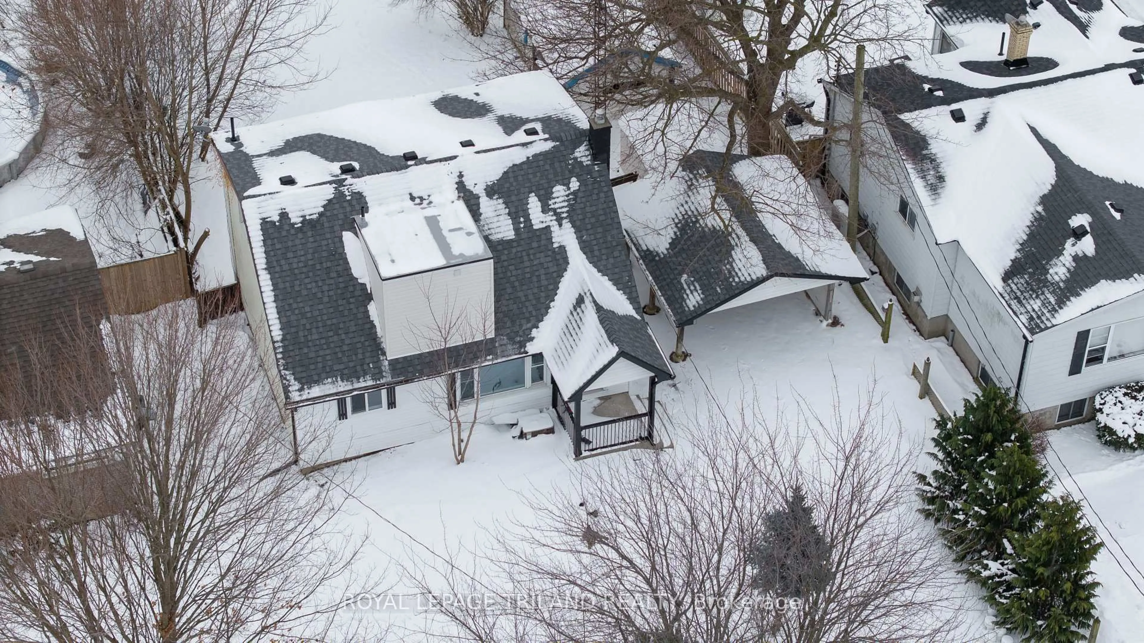 A pic from outside/outdoor area/front of a property/back of a property/a pic from drone, street for 1223 Sunningdale Rd, London North Ontario N5X 4B1