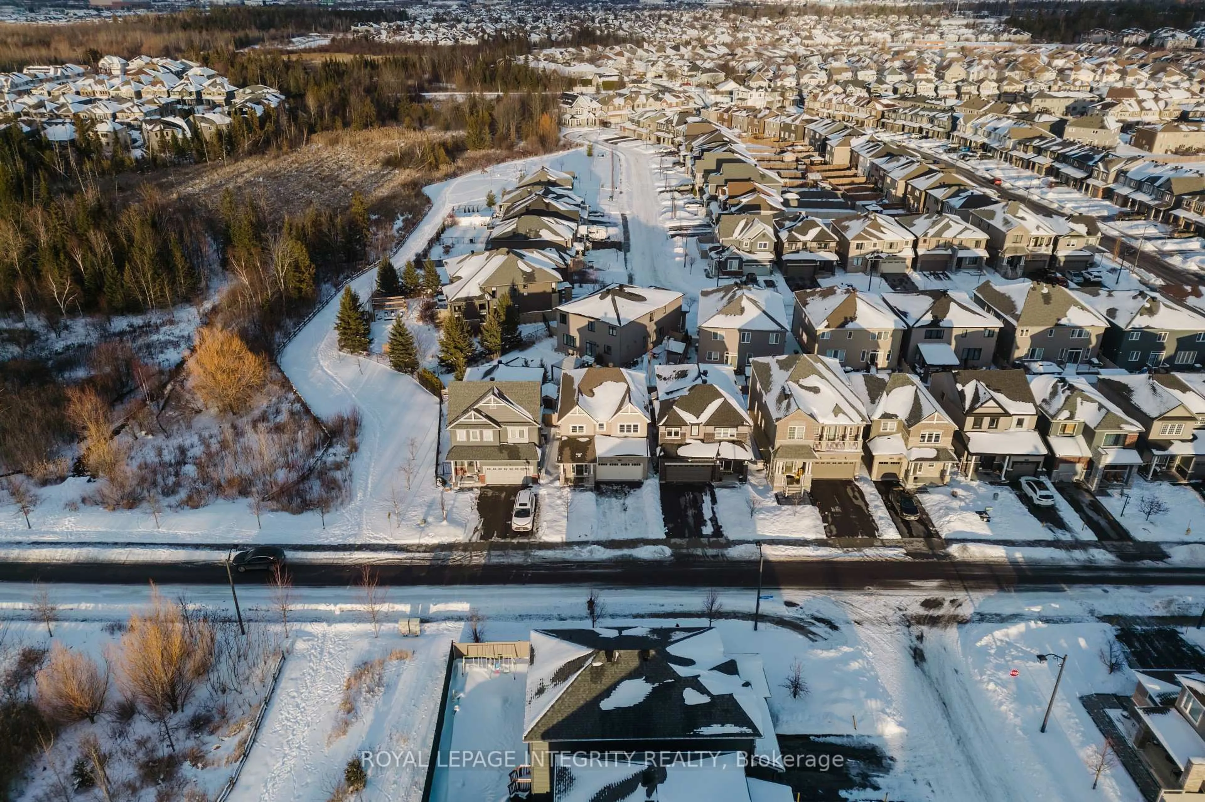 A pic from outside/outdoor area/front of a property/back of a property/a pic from drone, street for 719 Samantha Eastop Ave, Stittsville Ontario K2S 2H8