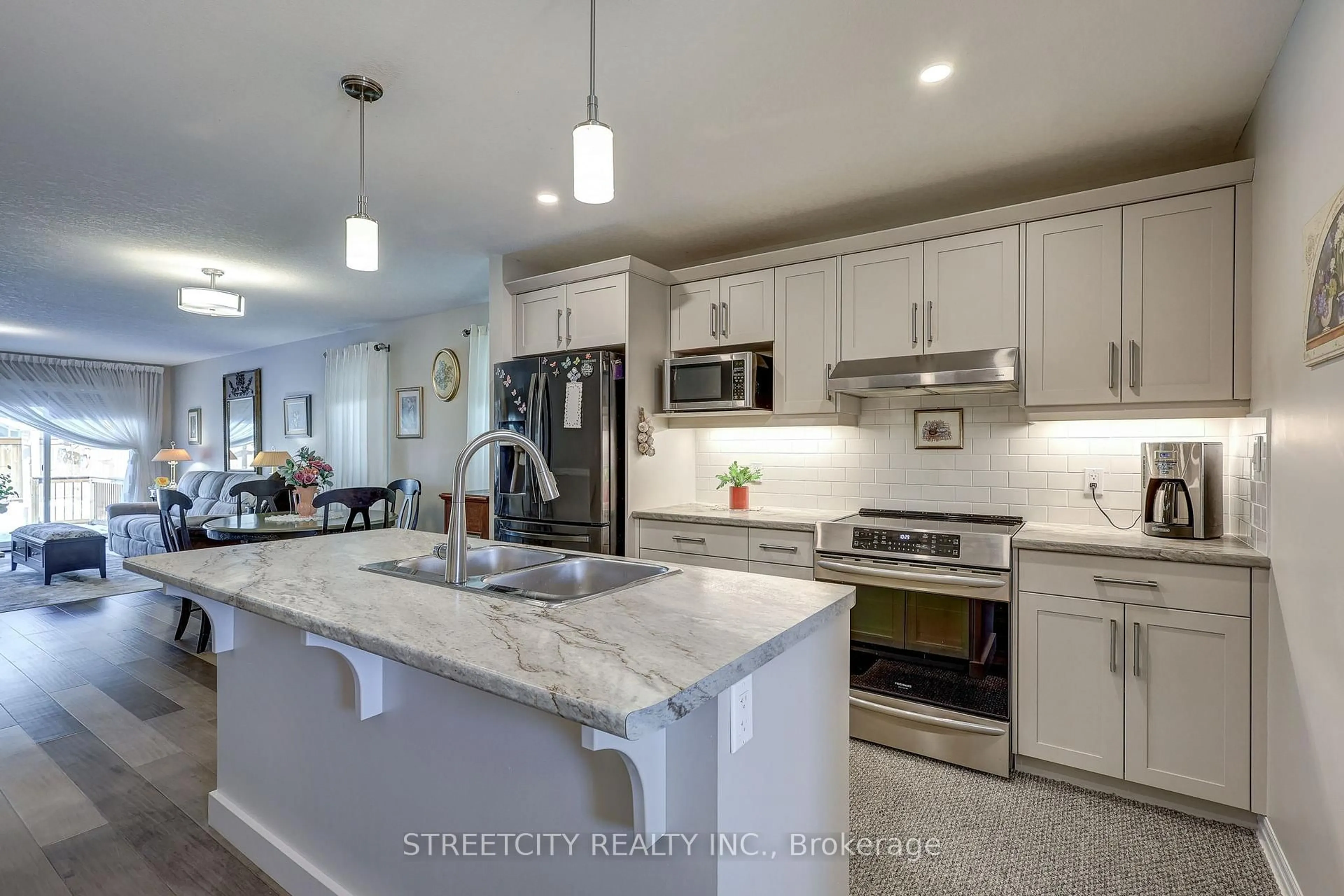 Open concept kitchen, ceramic/tile floor for 72 Ashberry Pl, St. Thomas Ontario N5R 0H9